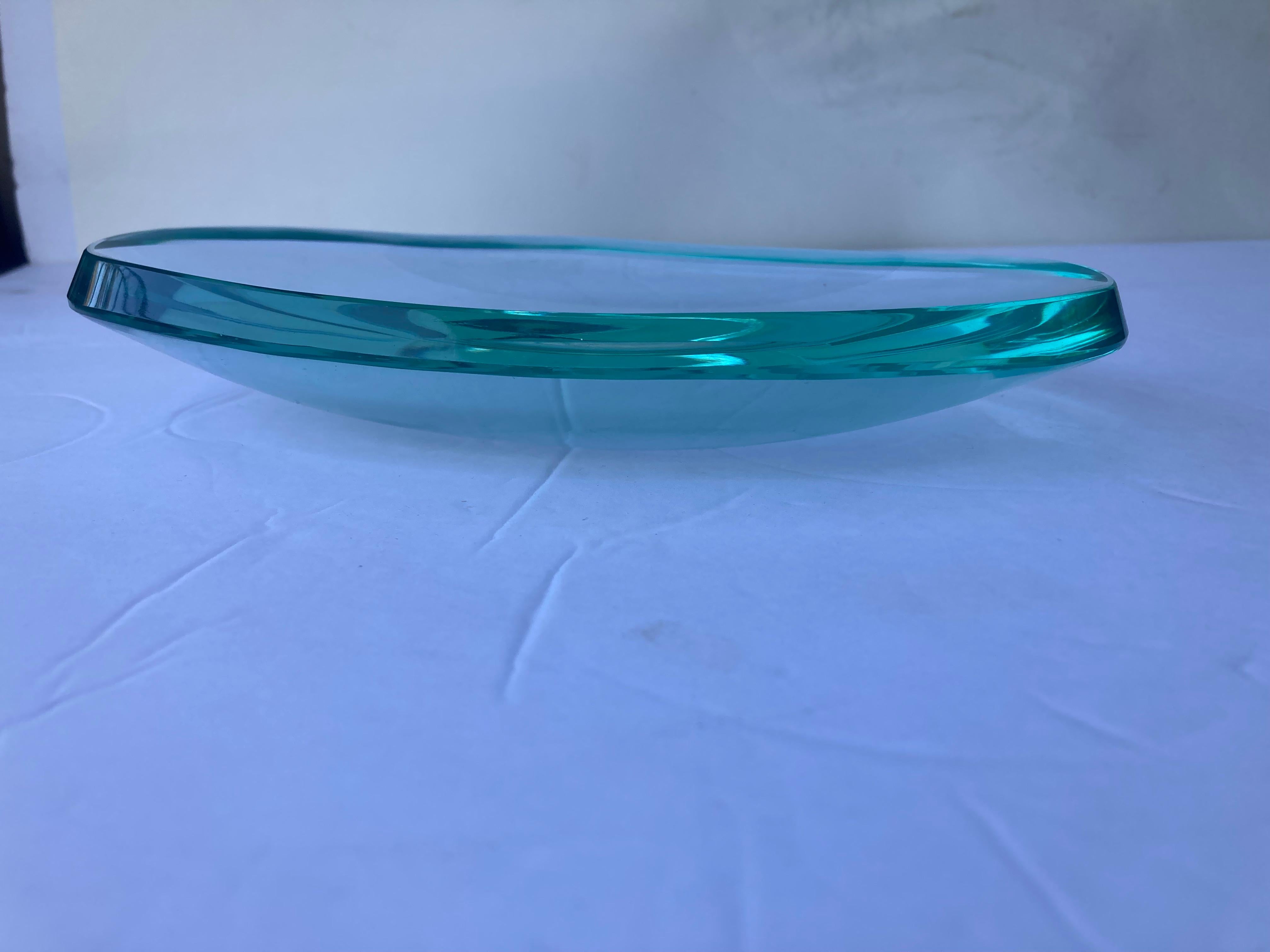 Beautiful freeform dish/Vide - Poche by Fontana Arte, with FX mark in bottom, shows light scratches near signature. Amazing green /blue color tone glass, very traditional for the early Italian glass work.