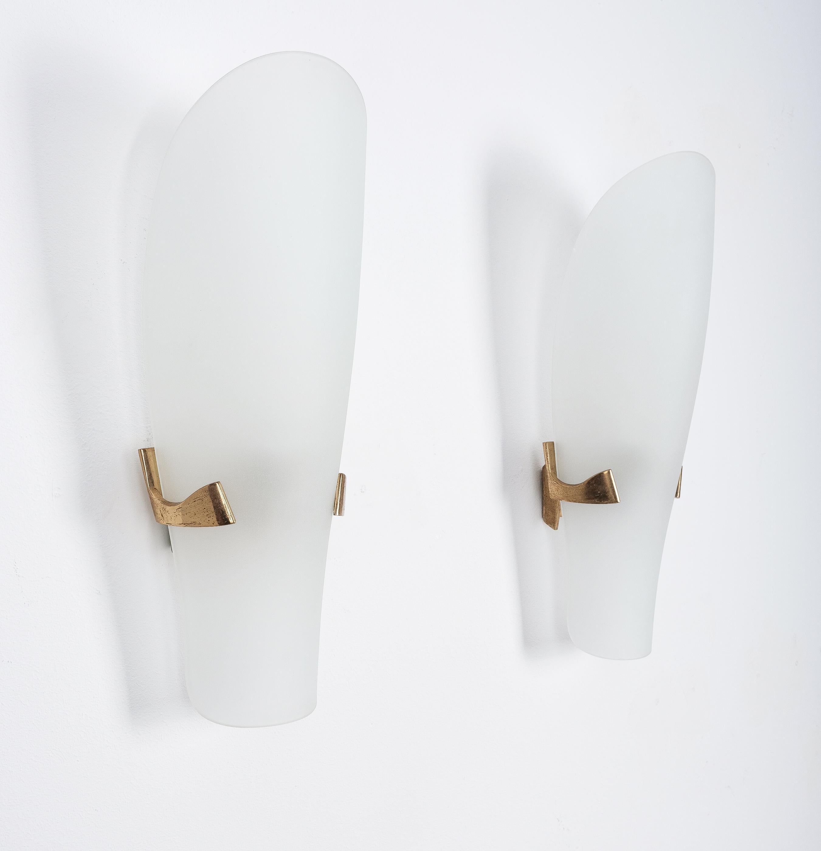 Pair of large Max Ingrand Fontana Arte sconces model #1636, Italy, 1960. 

We have 2 pairs available all with a light-blue shade. Priced per pair.

Formidable 15.7