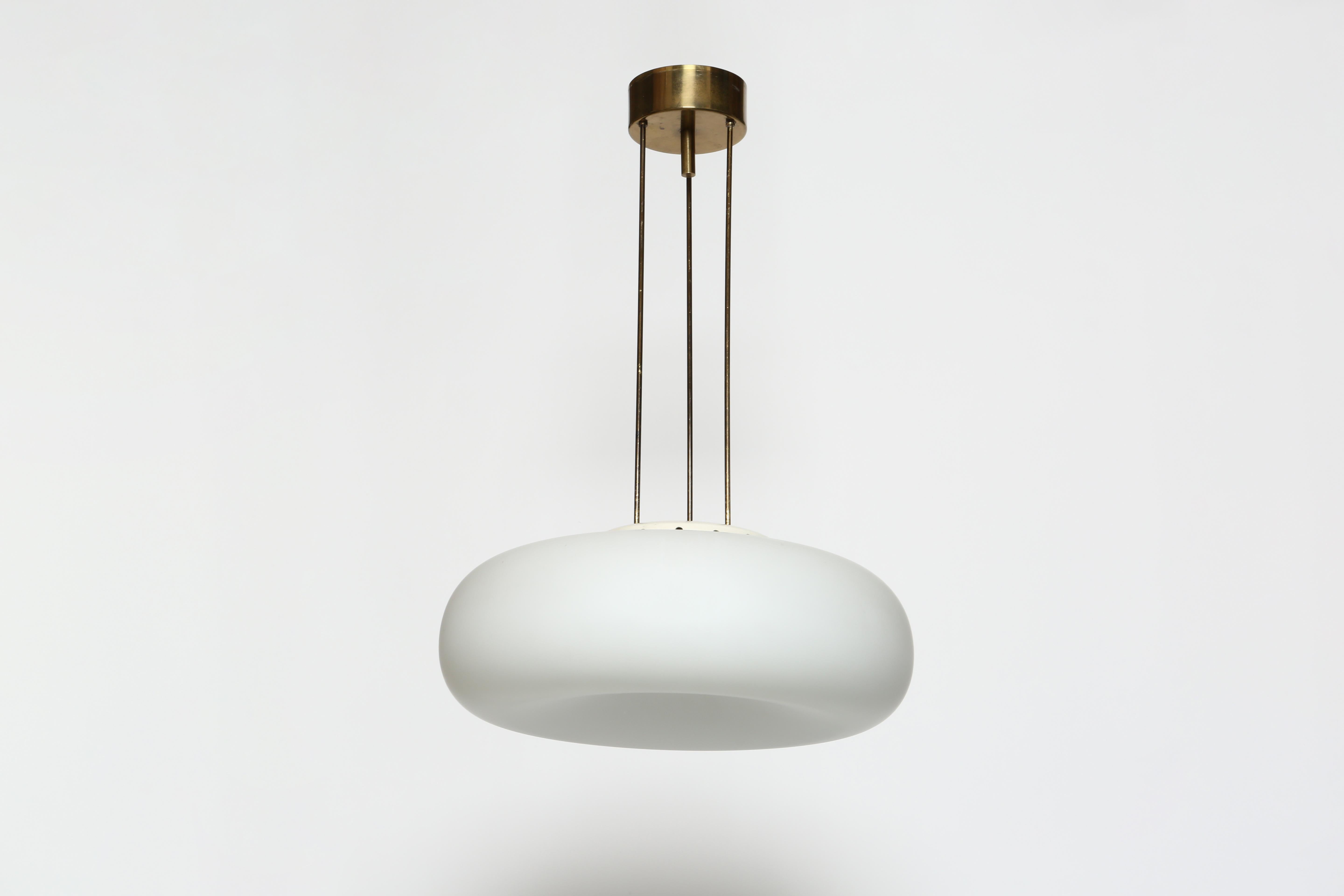 Max Ingrand for Fontana model 2356 ceiling suspension.
Designed and made in Italy in 1960s.
Satin opaline glass diffuser with beautiful warm patina brass.
Takes 4 candelabra E12 bulbs.
Complimentary US rewiring upon request.
Overall drop is