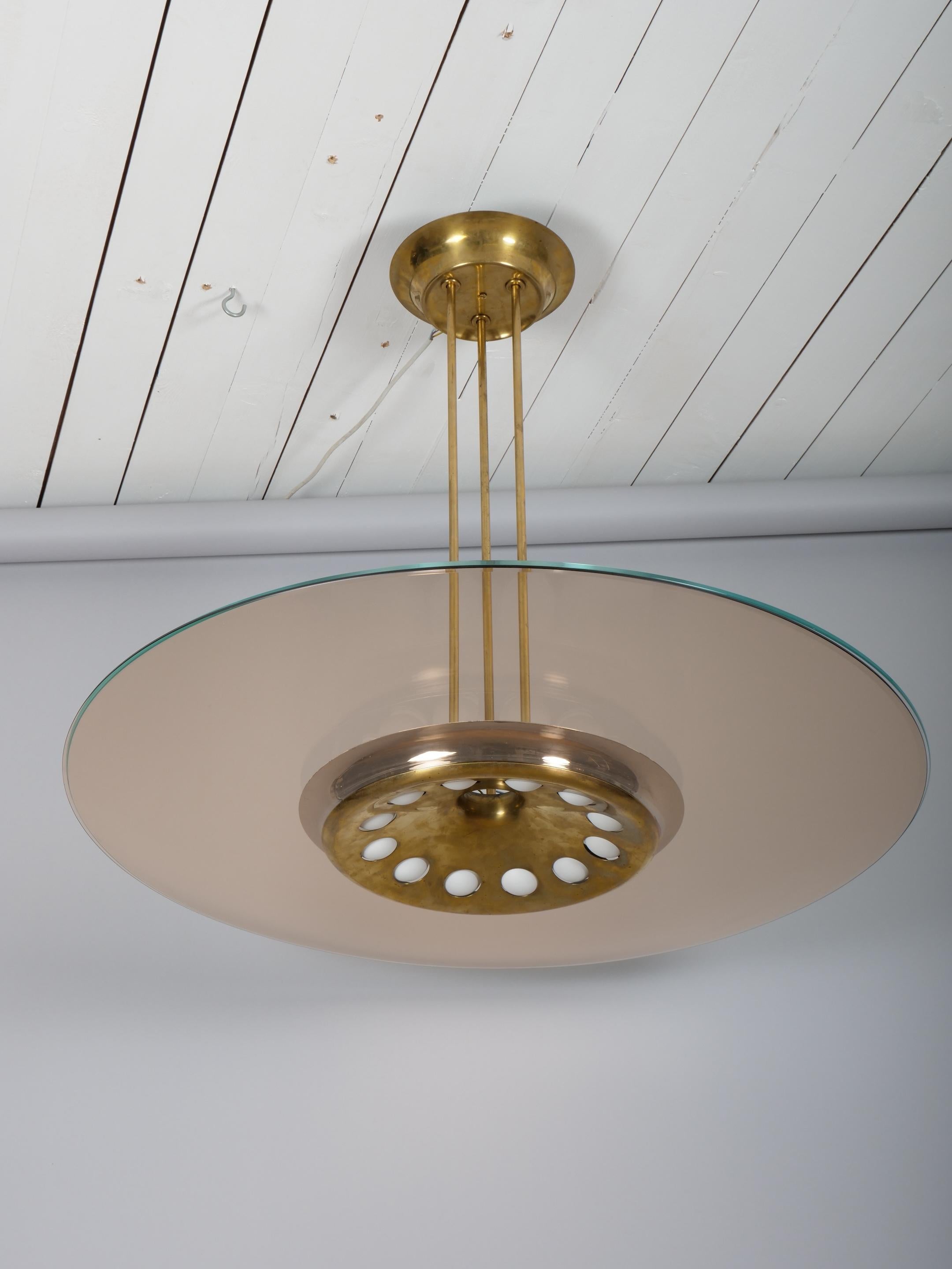 Curved coloured crystal glass and brass brass. Covered with a clear crystal glass dish.

Twelve spherical bulbs (E12) sockets. 25w