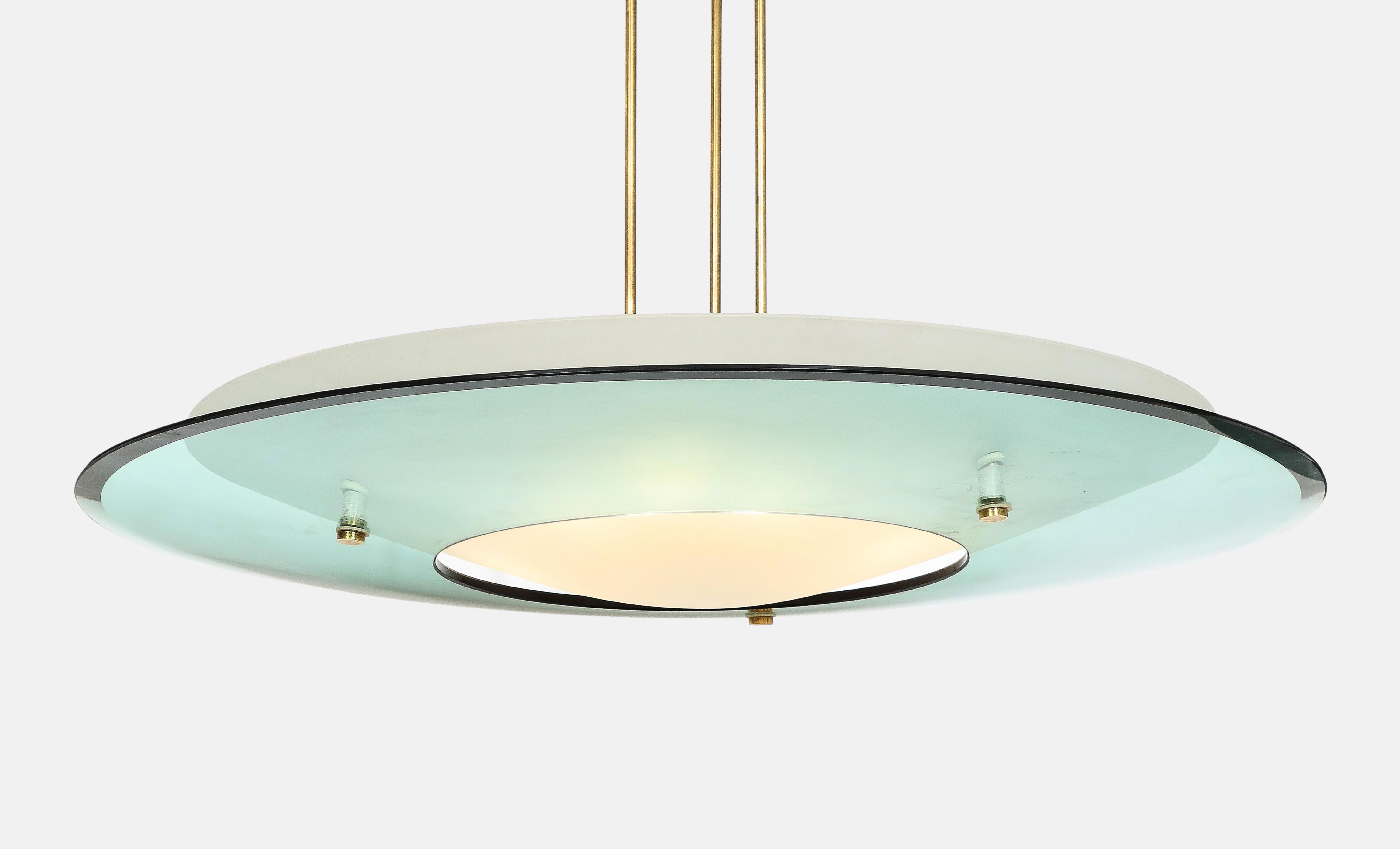 Max Ingrand for Fontana Arte exquisite chandelier model 2097 with large round outer bowl in curved colored beveled and polished crystal disc, connected below inner bowl in curved conical satin glass suspended by three brass rods and original canopy,