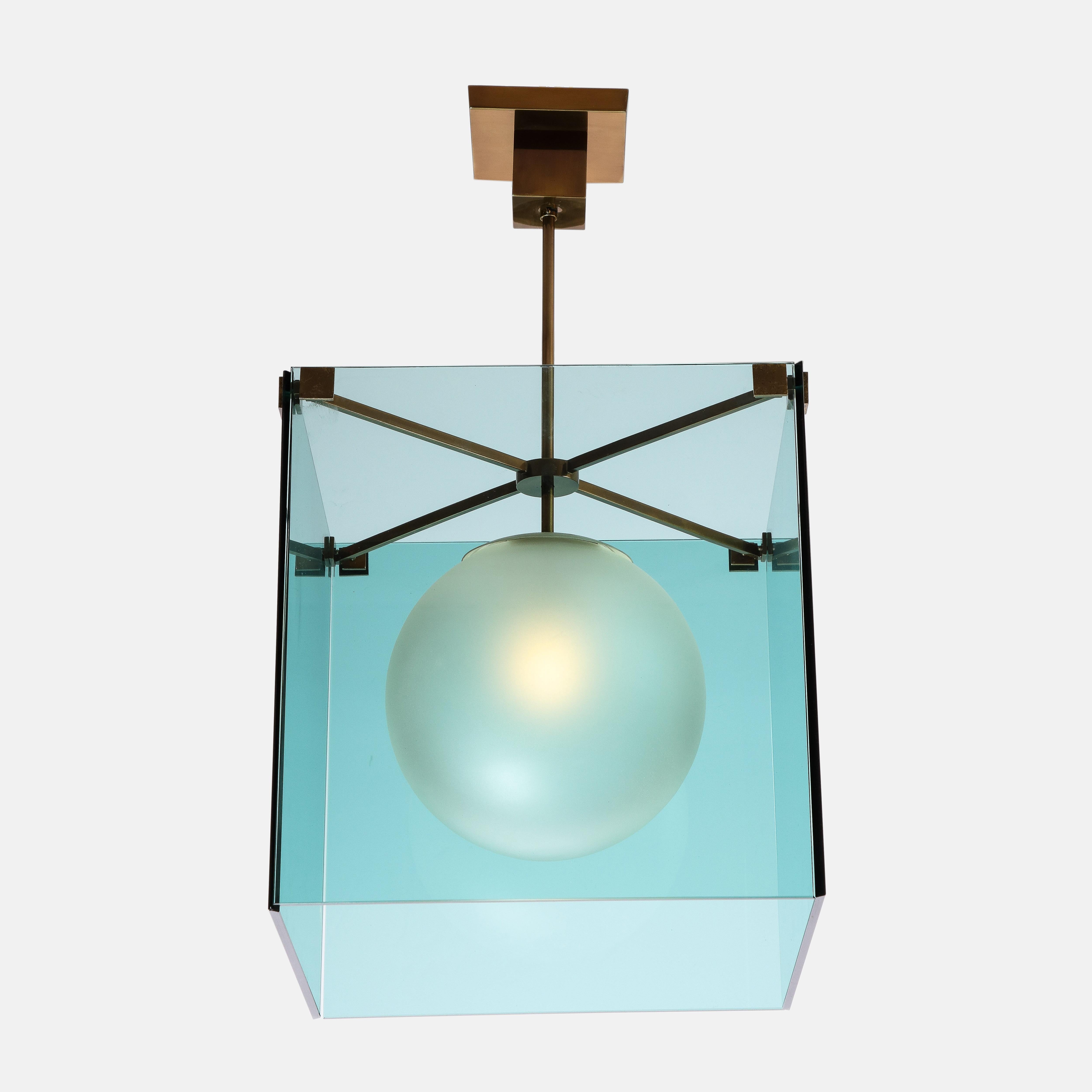 Max Ingrand for Fontana Arte rare chandelier model 2073 consisting of a satin or acid-etched glass globe diffuser inside four thick square plates of colored glass suspended on a brass structure with brass square mounts, and hung from original square
