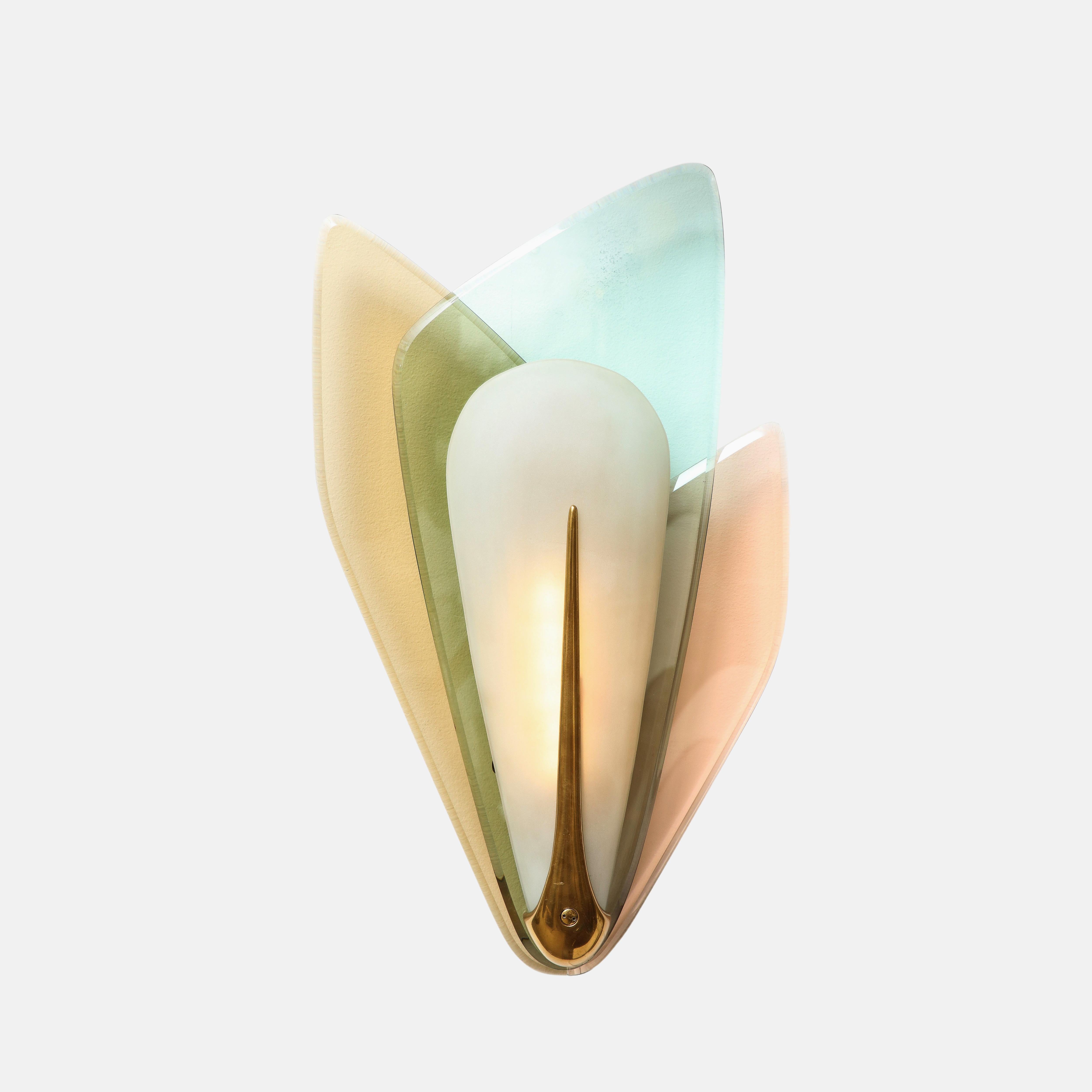 Max Ingrand for Fontana Arte rare and extraordinary pair of large sconces with three different beveled colored crystal glass layers fanning out from a central satin glass diffuser with an elegant brass teardrop mount, Italy, circa 1955.  This
