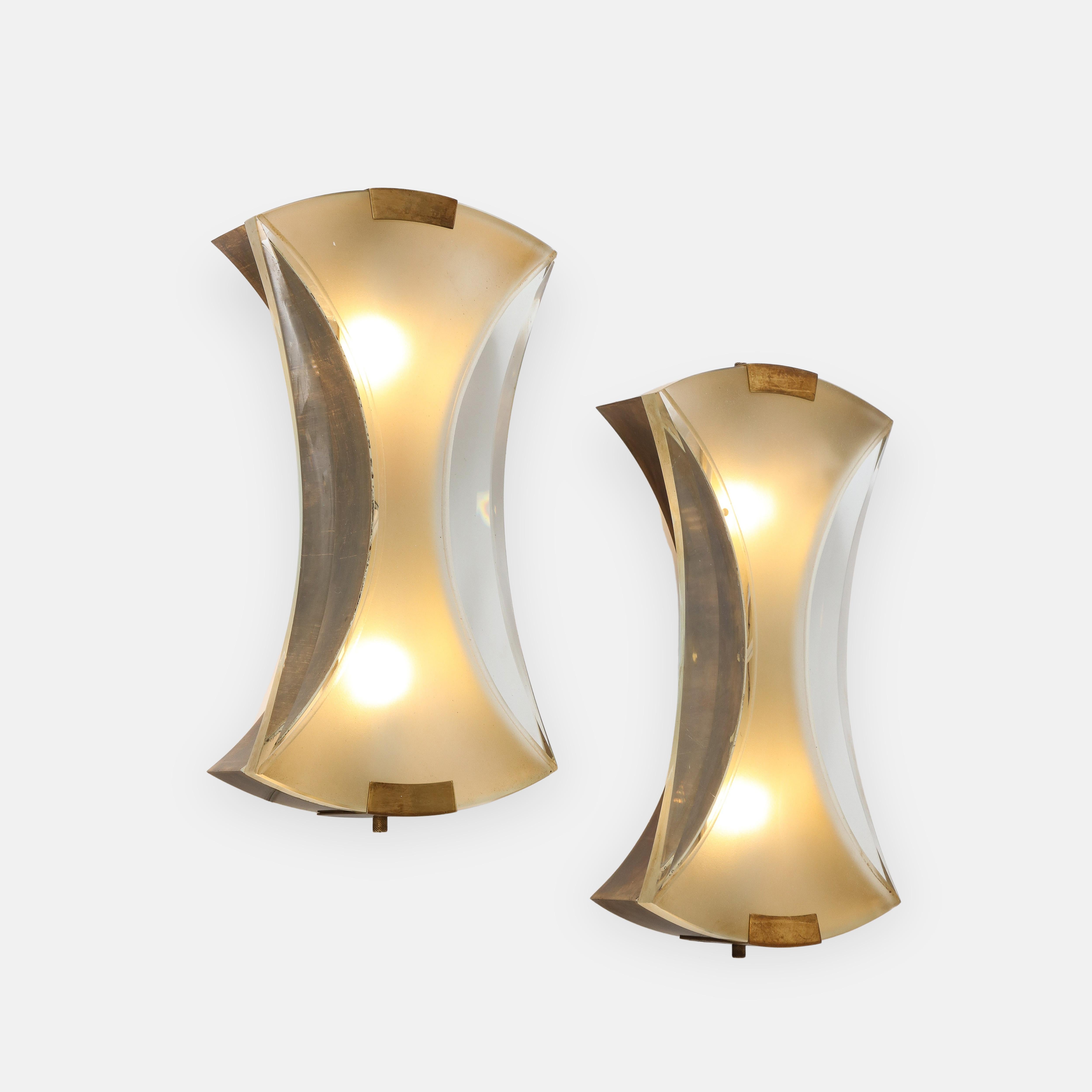 Max Ingrand for Fontana Arte rare pair of elegant modernist sconces model 2225 with central satin or acid-etched glass and outer clear polished glass suspended by brass fittings.
Recently rewired to U.S. standards.

Literature:
Franco Deboni,