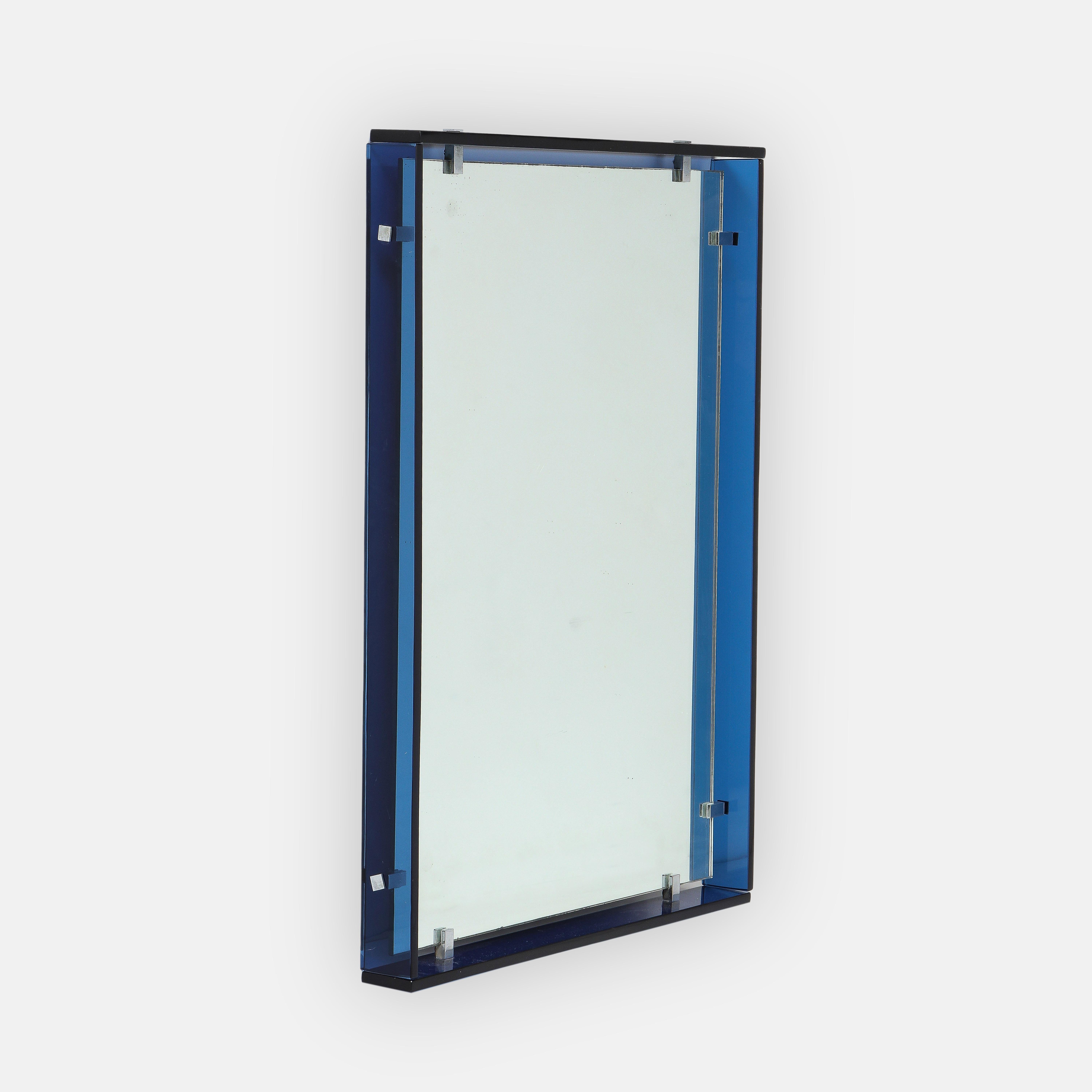 Max Ingrand for Fontana Arte modernist rectangular mirror model 2014 consisting of thick cobalt blue colored strips of crystal glass surrounding original mirrored glass with nickel-plated brass clip supports, Italy, 1960s. This chic avant-garde