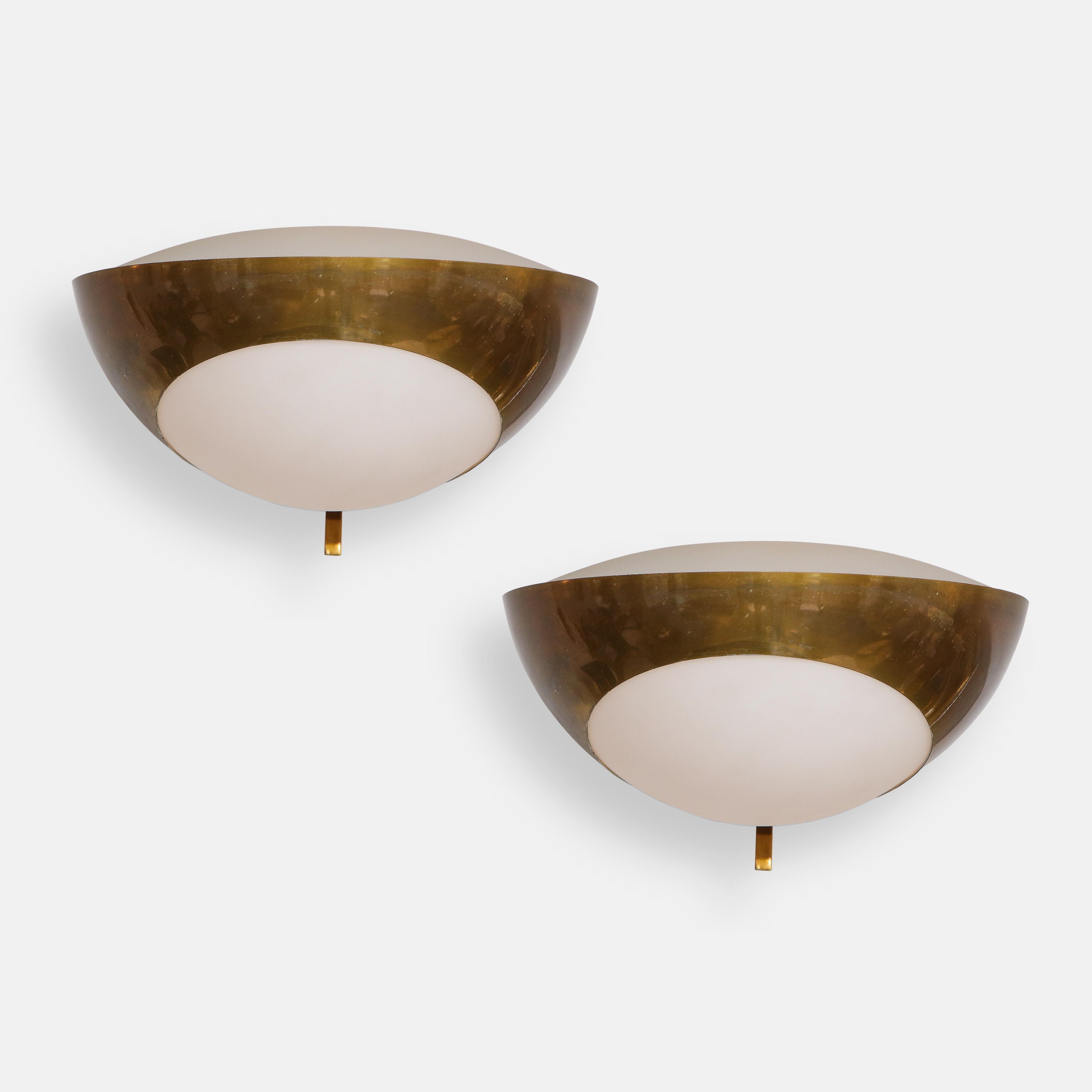 Max Ingrand for Fontana Arte rare set of four large model 1963 sconces, Italy, circa 1960. These exquisite sconces consist of brass structures which hold opaline glass diffusers below and above. This model exudes an elegance and simplicity in its