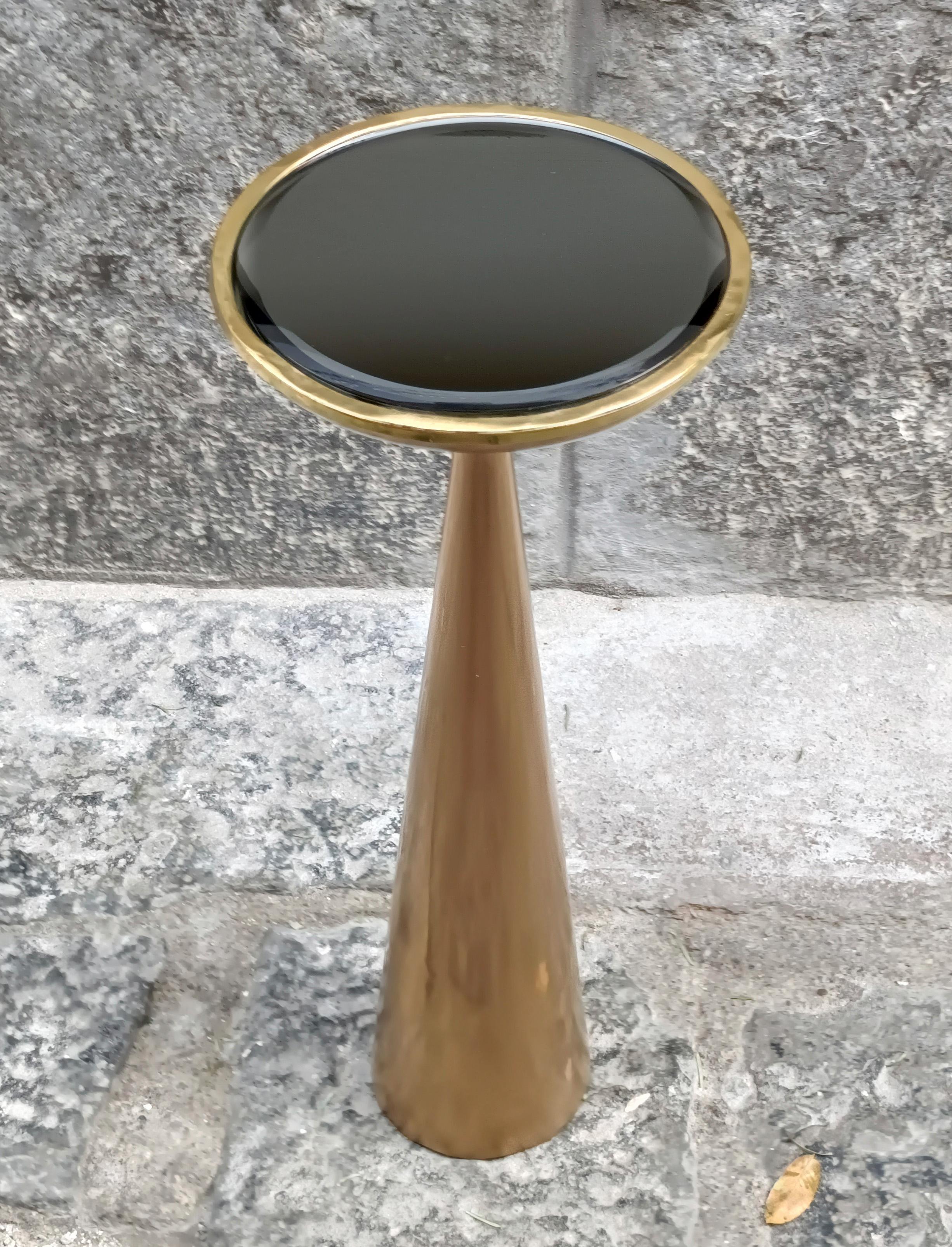 The mod. 1776 coffee table designed by Max Ingrand for Fontana Arte in the 1960s is a classic piece of mid-century modern Italian furniture. 
The mod. 1776 coffee table is characterized by its elegant and minimalist design. It features a circular