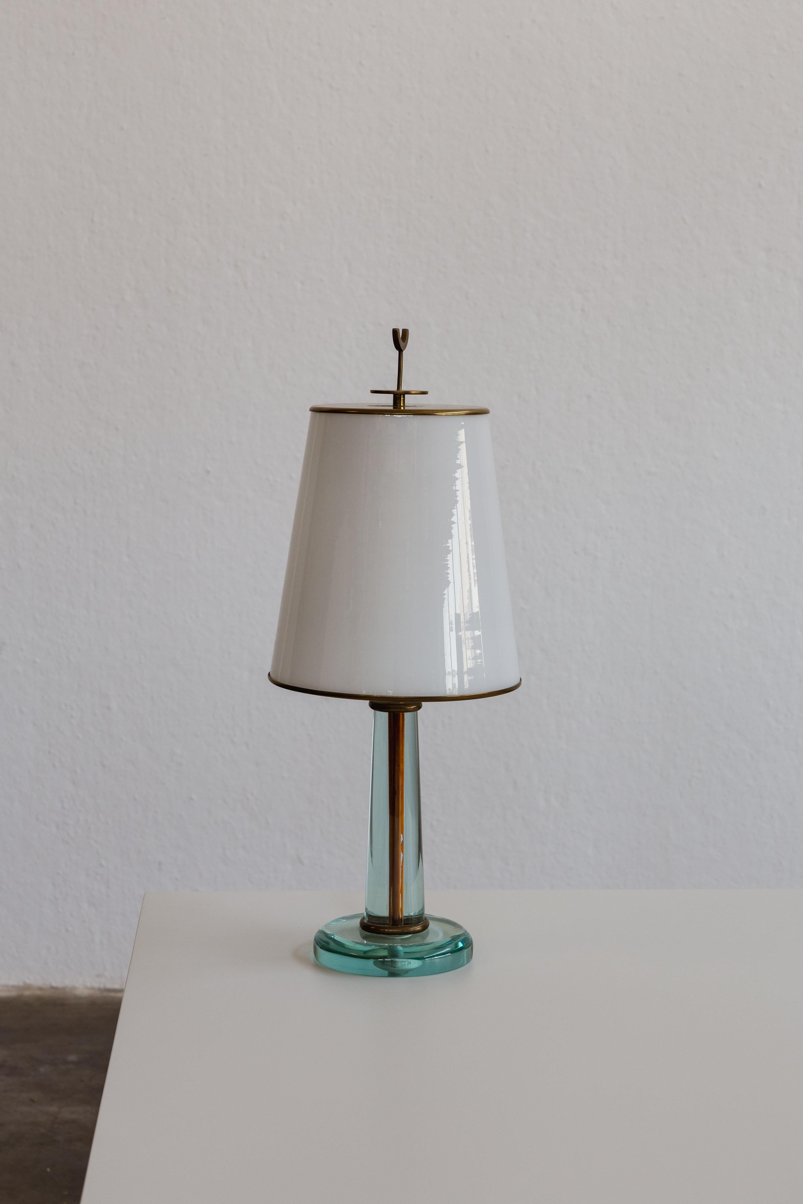 Max Ingrand, table lamp for Fontana Arte, glass, steel and wood, Italy, 1960.

Max Ingrand's timeless 1960 table lamp for Fontana Arte embodies the brand's quintessential style. The lamp features a base crafted in Chartreuse color glass with domed