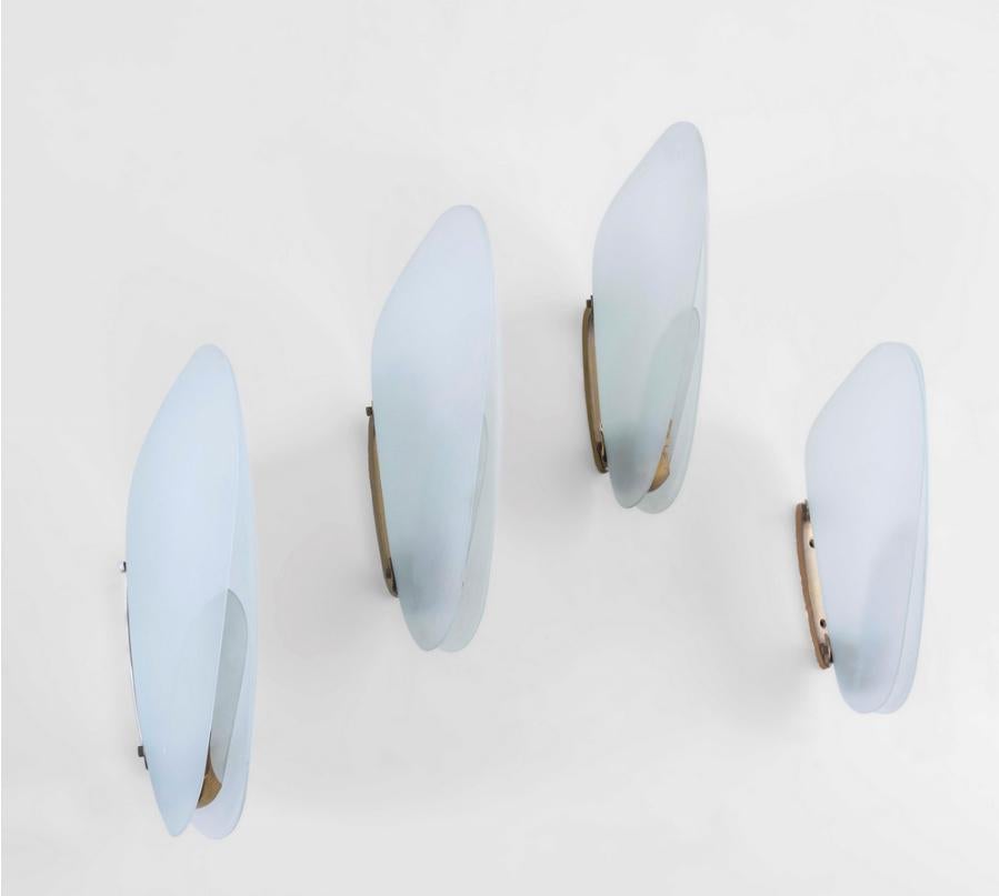 Max Ingrand wall-sconces produced about 1960 by Fontana Arte
Brass back plate and frosted glass.