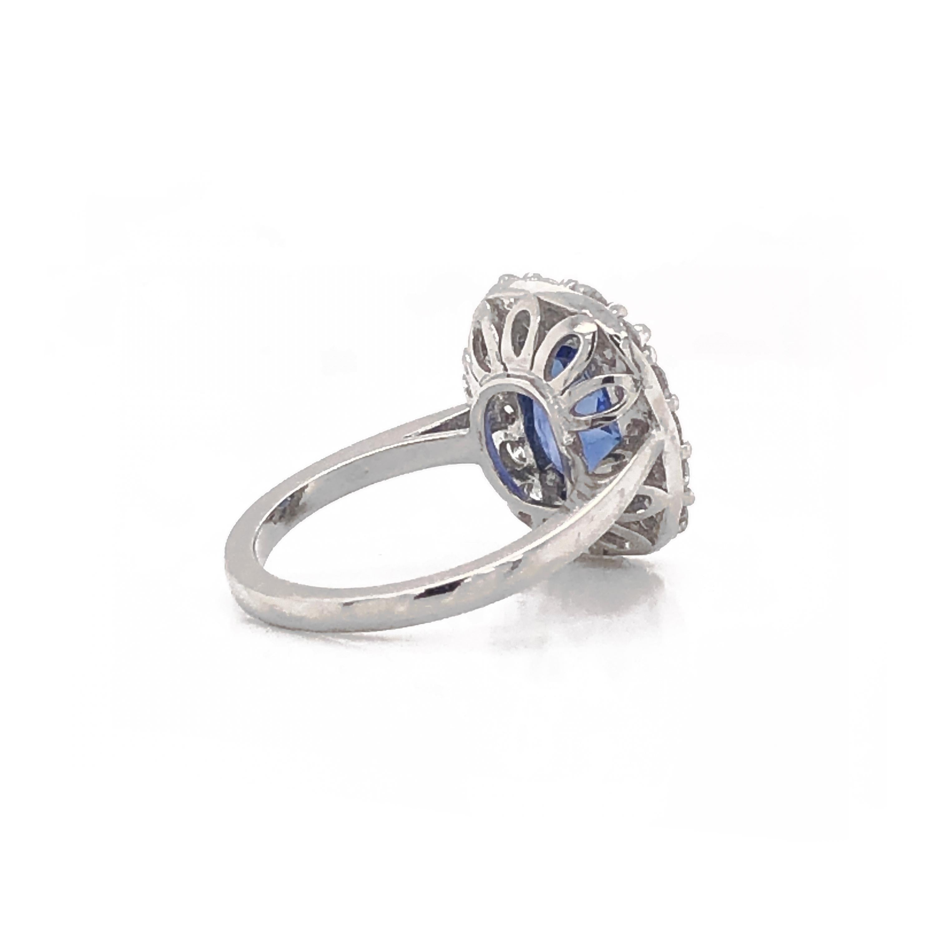 Contemporary Cushion blue ceylon oval sapphire 4.69 ct round diamonds 1.28 ct platinum ring For Sale