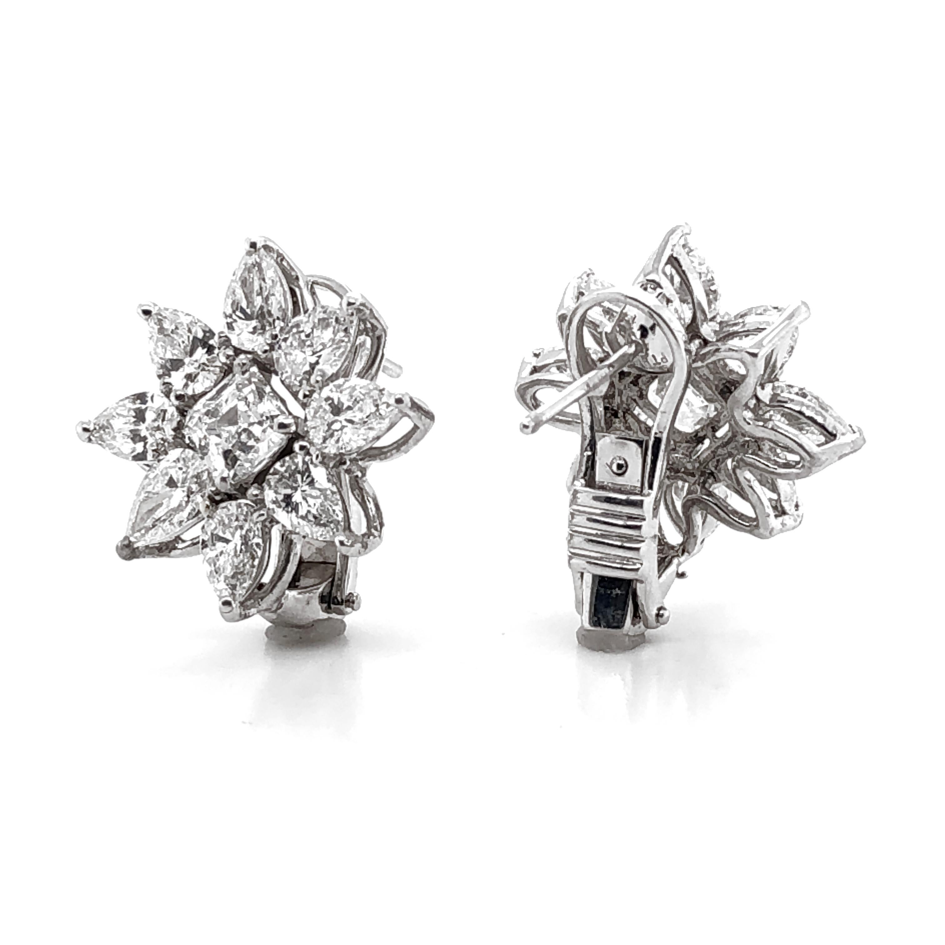 Gorgeous flower inspired contemporary earrings in platinum 950.
Earrings adorned with white natural diamonds.
Center diamonds are GIA certified square emerald cut 1.87 ct.
Accent of pear cut diamonds 4.96 ct. 
All diamonds are in G-H Color Clarity