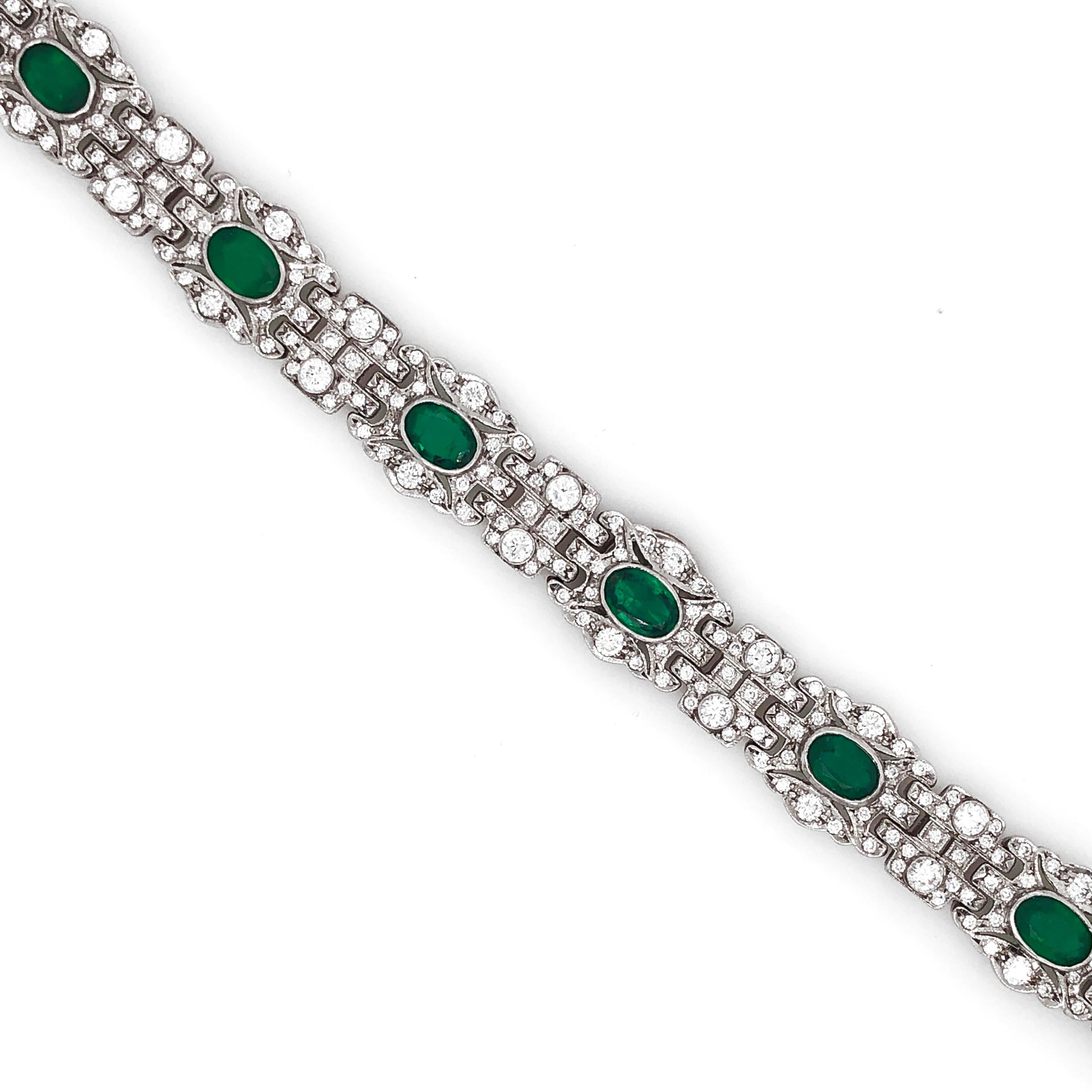 Elegant Art Deco / Retro inspired platinum bracelet.
Round natural diamonds 5.96 ct in G-H color clarity VS.
Oval Zambian emeralds 5.68 ct. 
Length: 18 cm
Width: 1.3 cm
Weight: 44 g