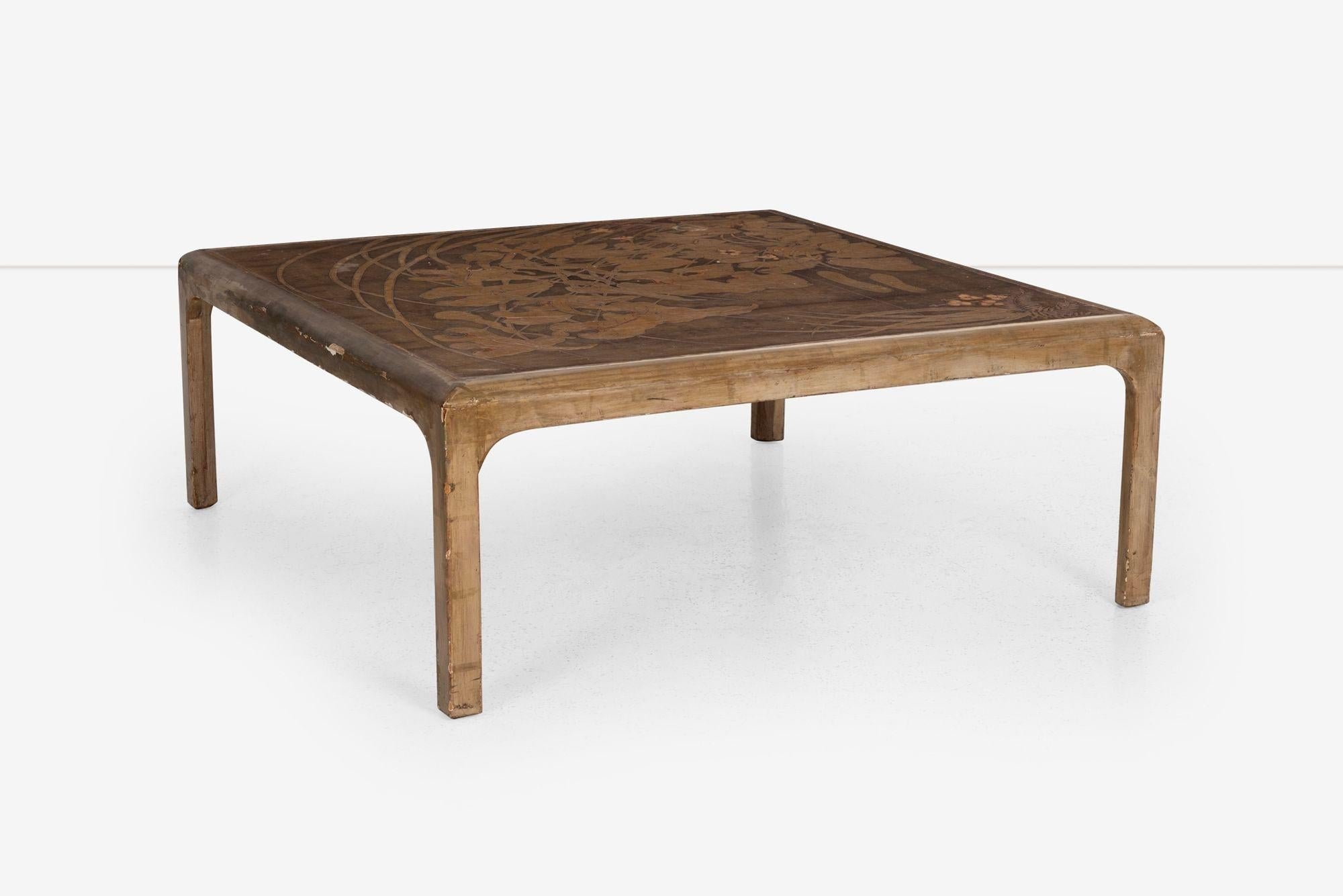 Max Kuehn Rectangular Coffee Table 1940's
This stunning hand-carved and painted coffee table by Max Kuehn showcases remarkable versatility. It can be styled as a single table with curved or straight lines, or used as individual tapered end tables
