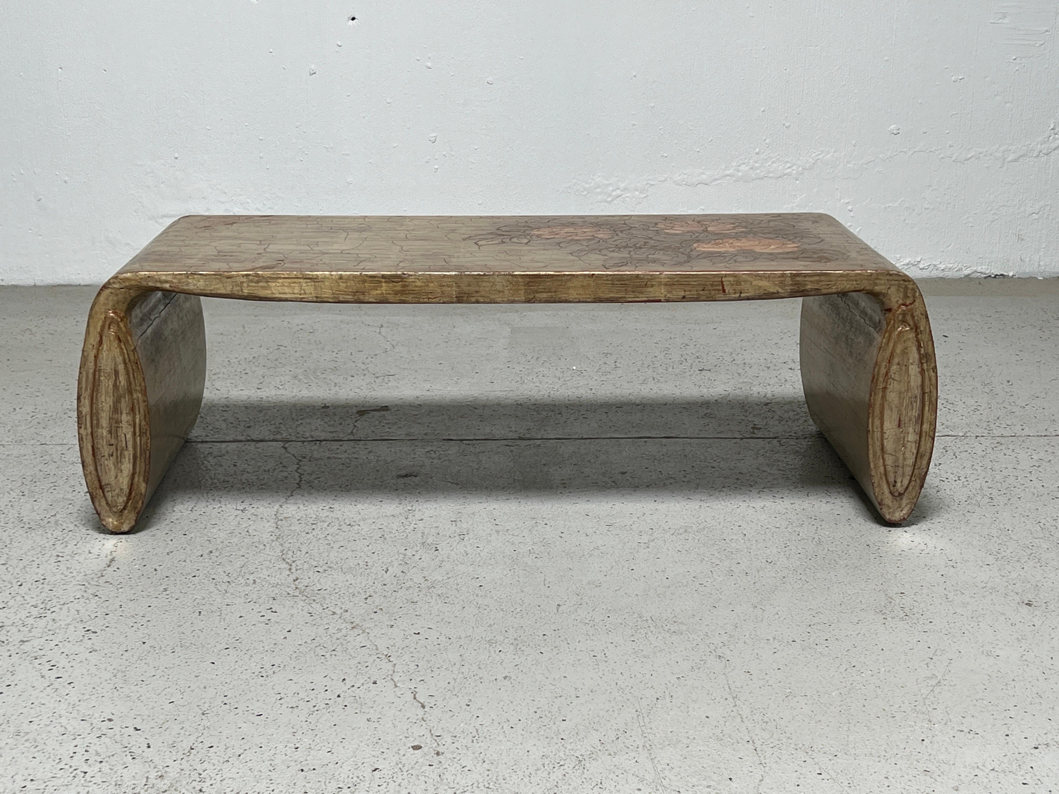 MAX KUEHNE (1880-1968) 
Low rectangular waterfall table with gilded and incised gesso floral painted decoration. Signed: Max Kuehne American, c. 1935.