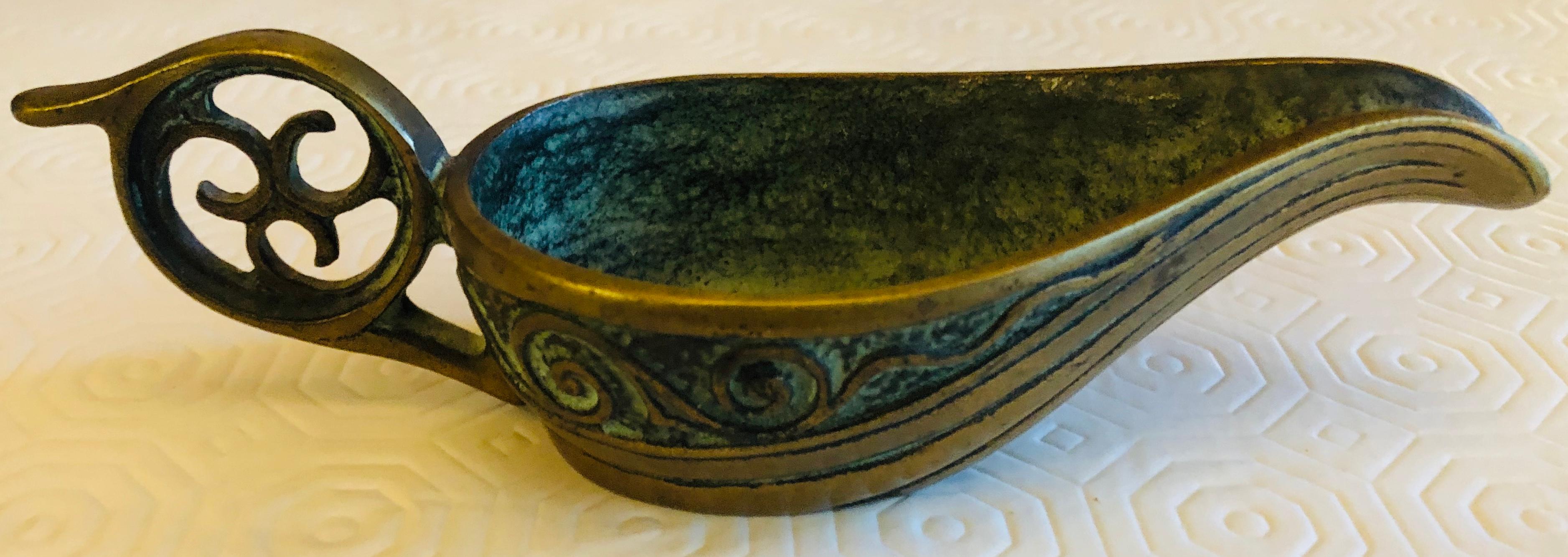 Stunning bronze Art Deco key bowl or vide poche signed Max Le Verrier, France, circa 1930. Remarkable craftsmanship typical of this makers quality pieces. 

This Max Le Verrier bronze makes a wonderful key bowl or desk accessory. It is an