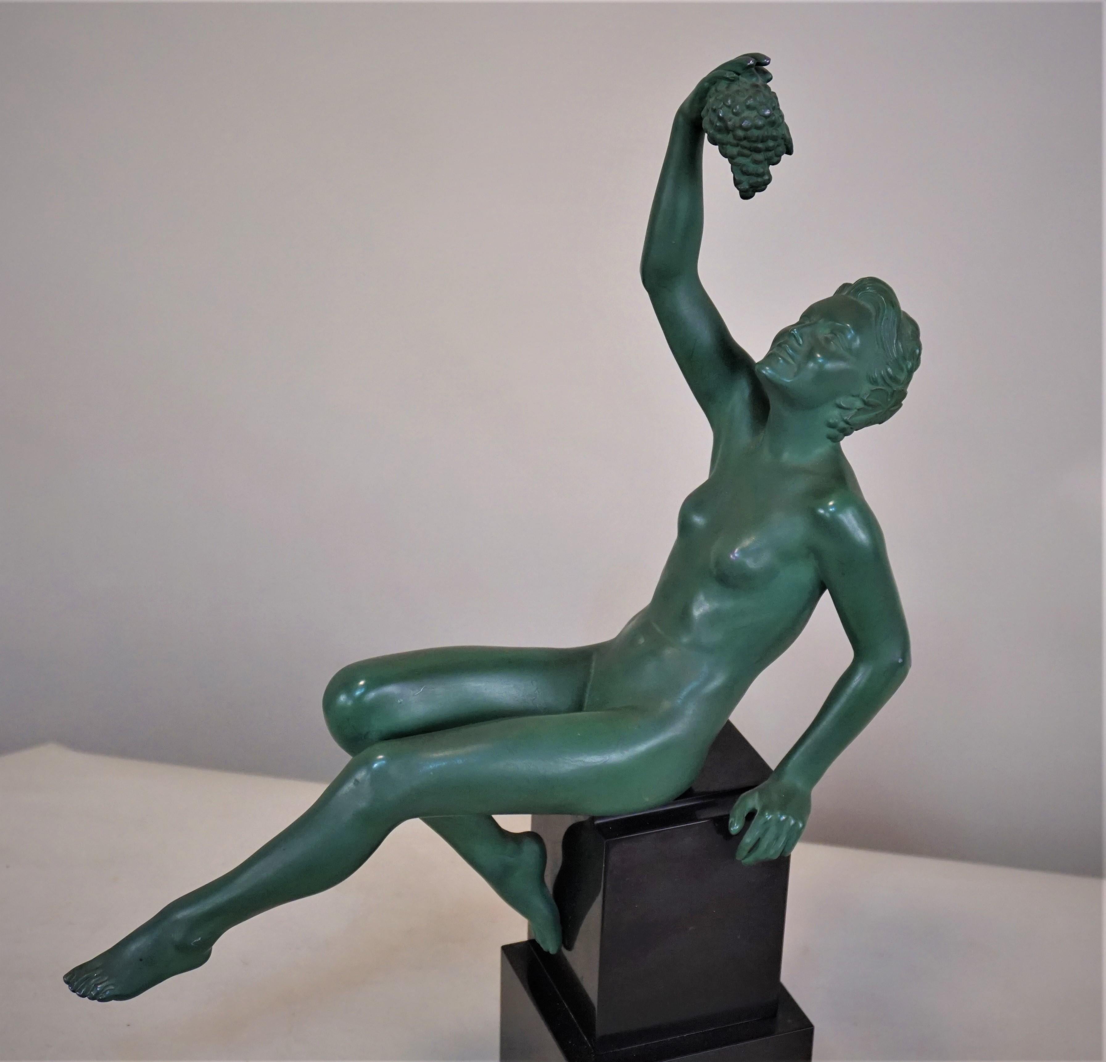 This elegant Art Deco sculpture was created by the iconic sculptor and designer Max Le Verrier in 1925. The elegantly poised nude female figure with grape.
The sculpture is larger than standard one that he has done.