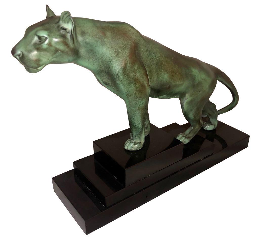 Max Le Verrier Art Deco sculpture of a panther France 1930 

Beautifully sculpted panther modelled climbing and leaning forward, looking keenly interested in what lies ahead. Alert and at the ready, this fine animal strikes a powerful yet elegant