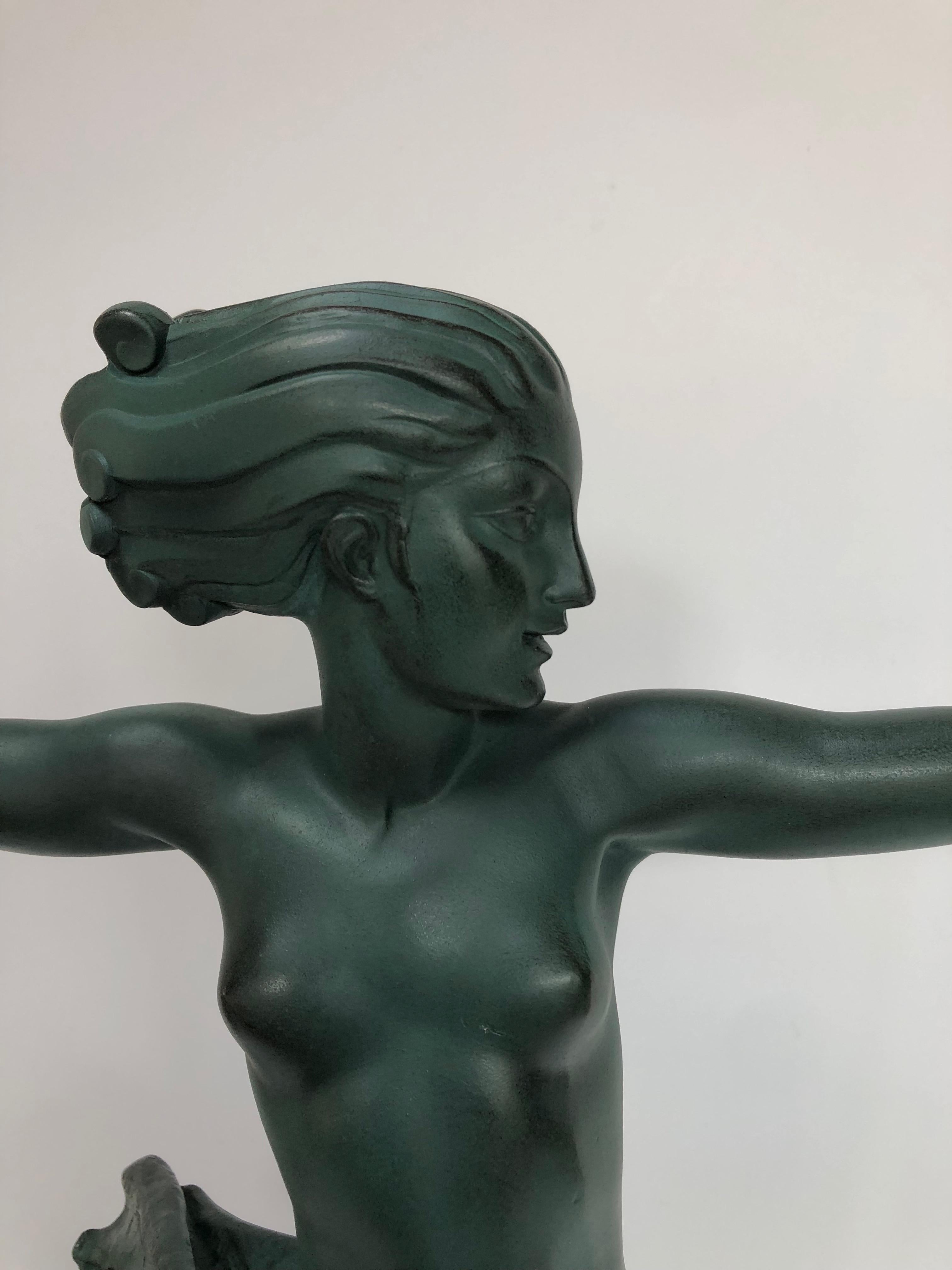 Art deco sculpture circa 1930 in spelter with green patina.
Large model, Portor marble base.
In perfect condition.
 Signed on the marble M. le verrier
Total height: 80 cm
Width: 41 cm
Depth: 16.5 cm
Weight: 12 Kg


Max Le Verrier was born on 29
