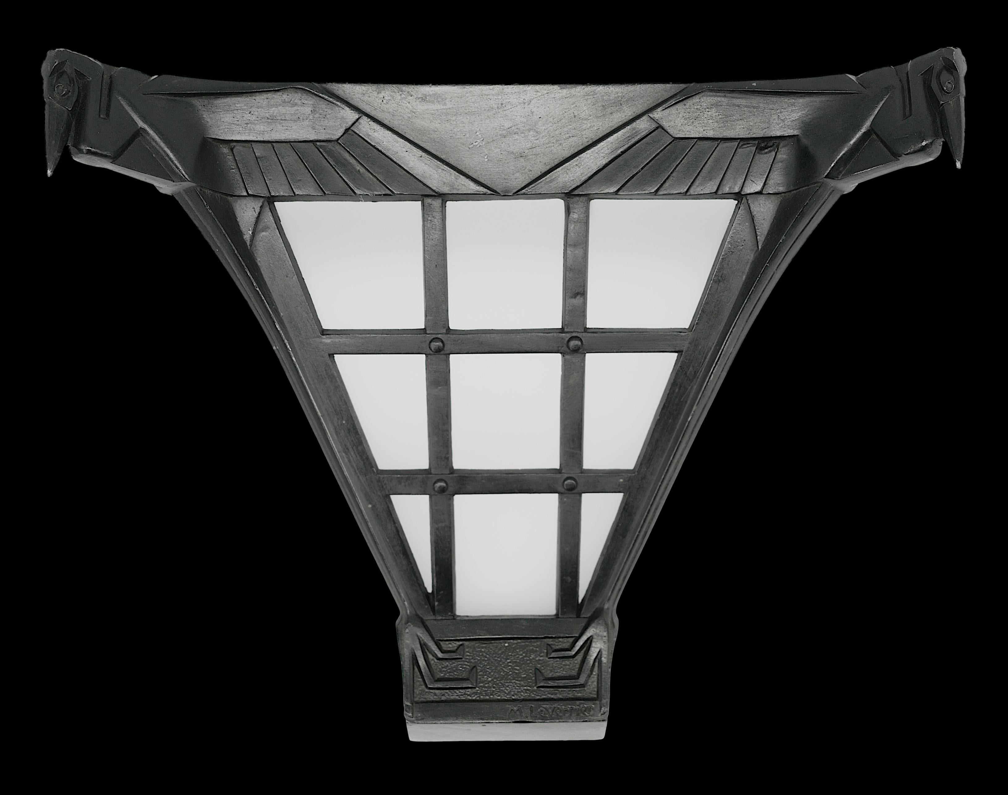 French Art Deco marabou wall sconce by MAX LE VERRIER, France, 1920s. MLV spelter and frosted glass. Lattice wall light with frosted glass. It is framed by 2 marabous in flight, their heads protruding from the upper corners, the wings spread on the