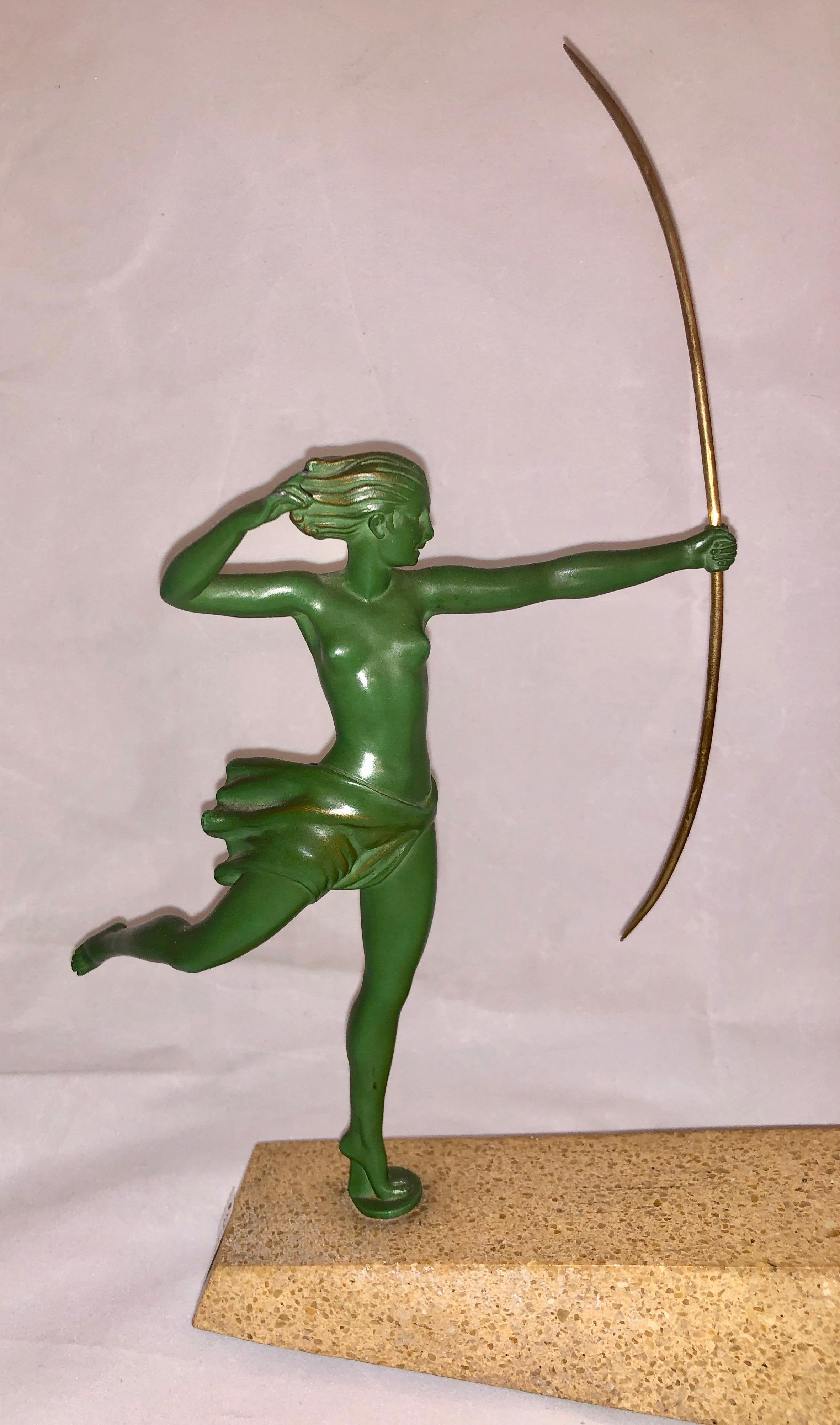 This is Diana the Huntress, a theme often repeated in Art Deco folklore. What makes this piece so spectacular: It has the style, small size and all the elements. The quality is of the best petite bronze metal with special green patina, very heavy