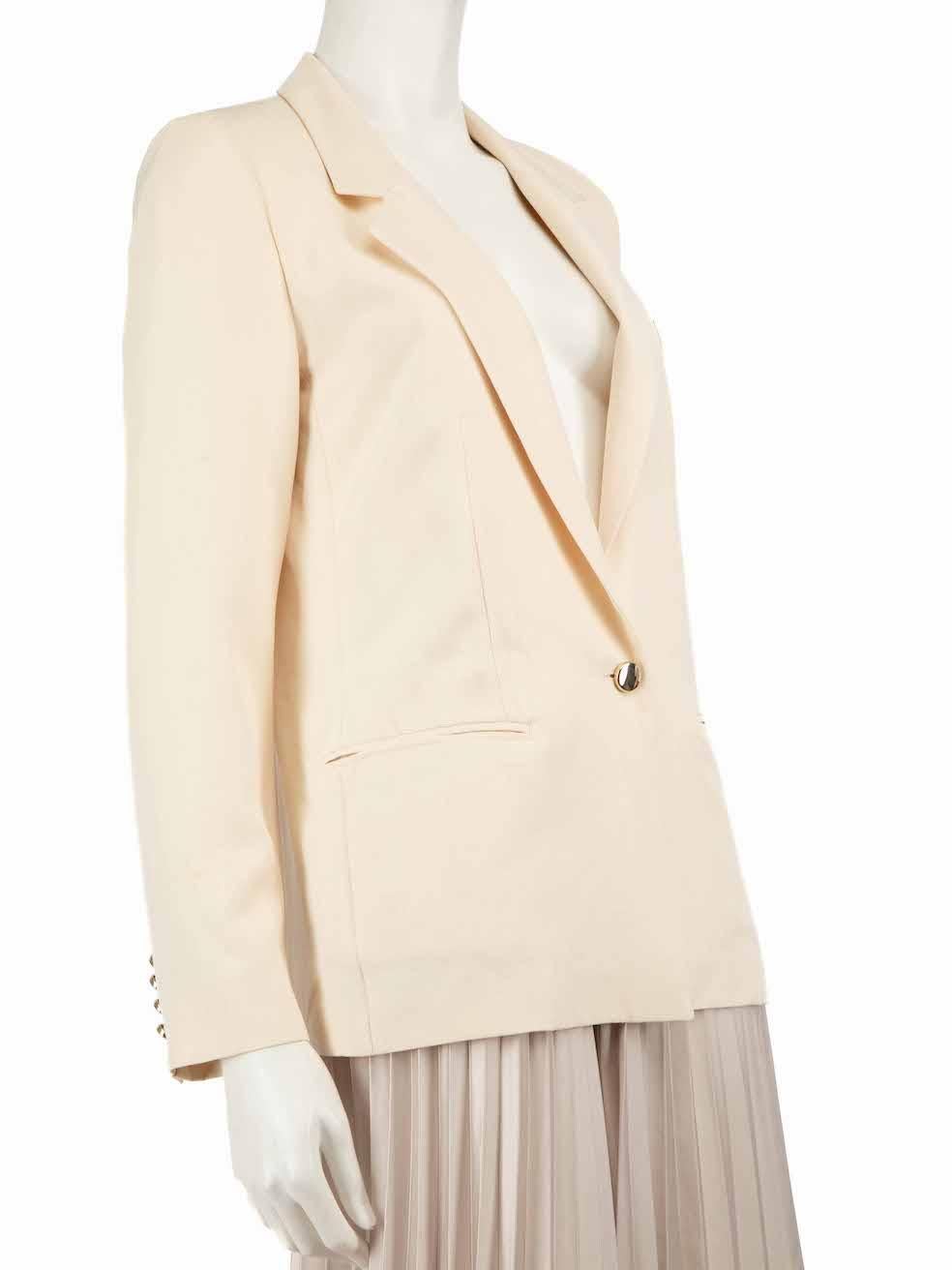 CONDITION is Good. Minor wear to the blazer is evident. There are marks on the both front panels of the blazer, the back of the left and right sleeve. The button on the left front panel is loose and there are slight pulls to the weave on the back of