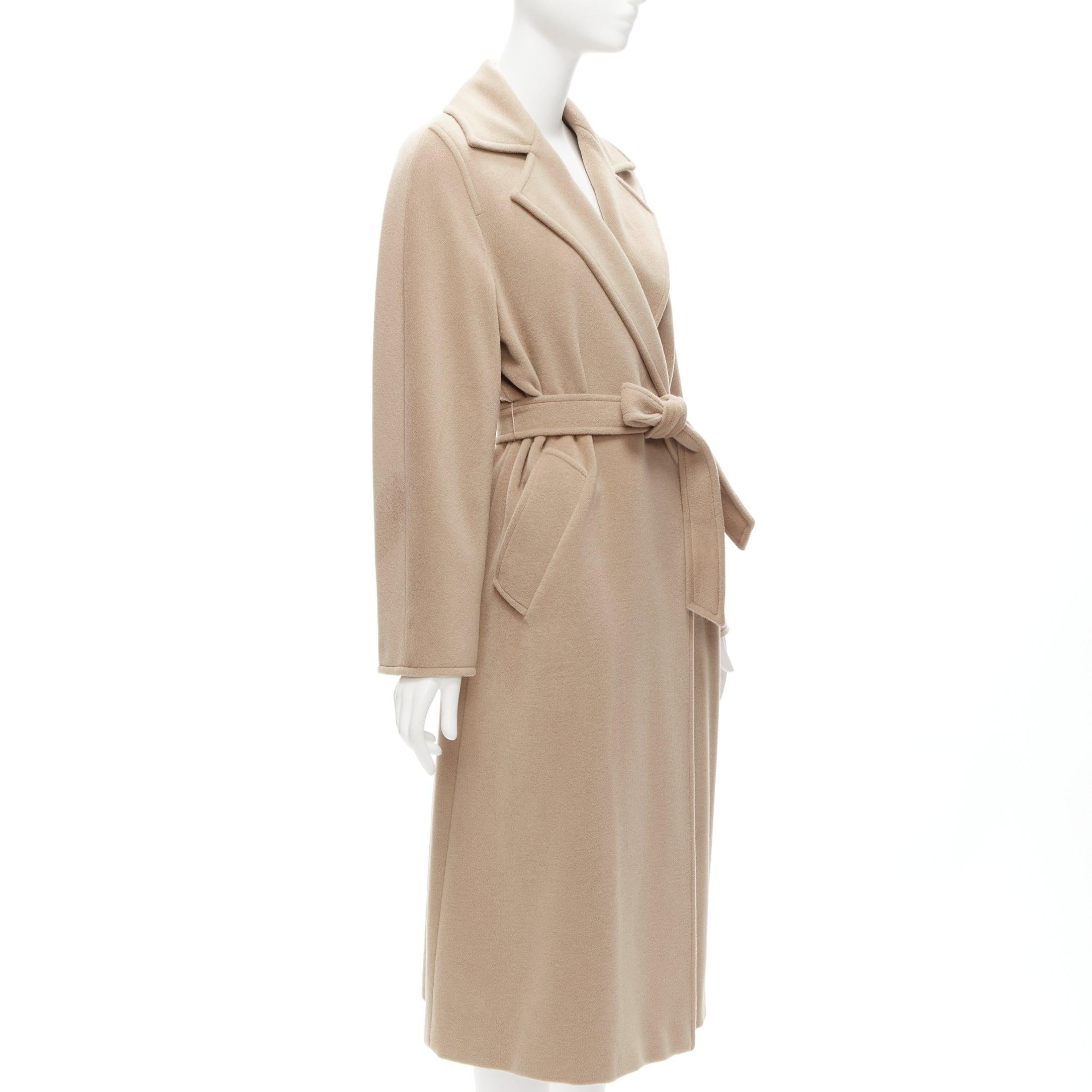 MAX MARA beige virgin wool Angora tie belt long overcoat IT38 XS
Reference: TGAS/D00968
Brand: Max Mara
Material: Virgin Wool, Angora
Color: Beige
Pattern: Solid
Closure: Belt
Lining: Gold Fabric
Extra Details: Double breasted with belt. Single vent