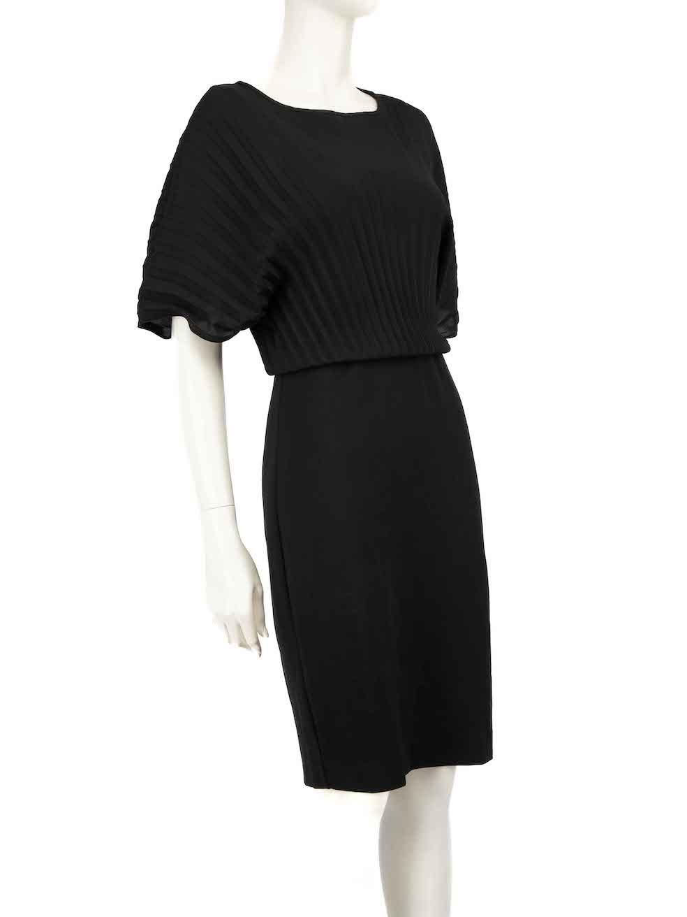CONDITION is Very good. Minimal wear to dress is evident. Minimal wear to the bottom of the dress is seen with abrasion marks on this used Max Mara designer resale item.
 
 
 
 Details
 
 
 Black
 
 Viscose
 
 Dress
 
 Pleated top
 
 Short sleeves

