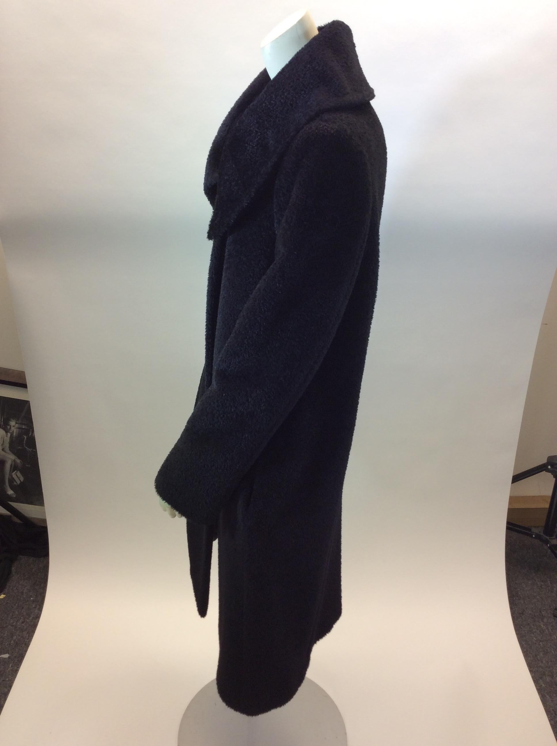 Max Mara Black Wool Coat
$299
52% Alpaca, 48% Wool
Size 12
Length 42”
Bust 42”
Waist 40”
