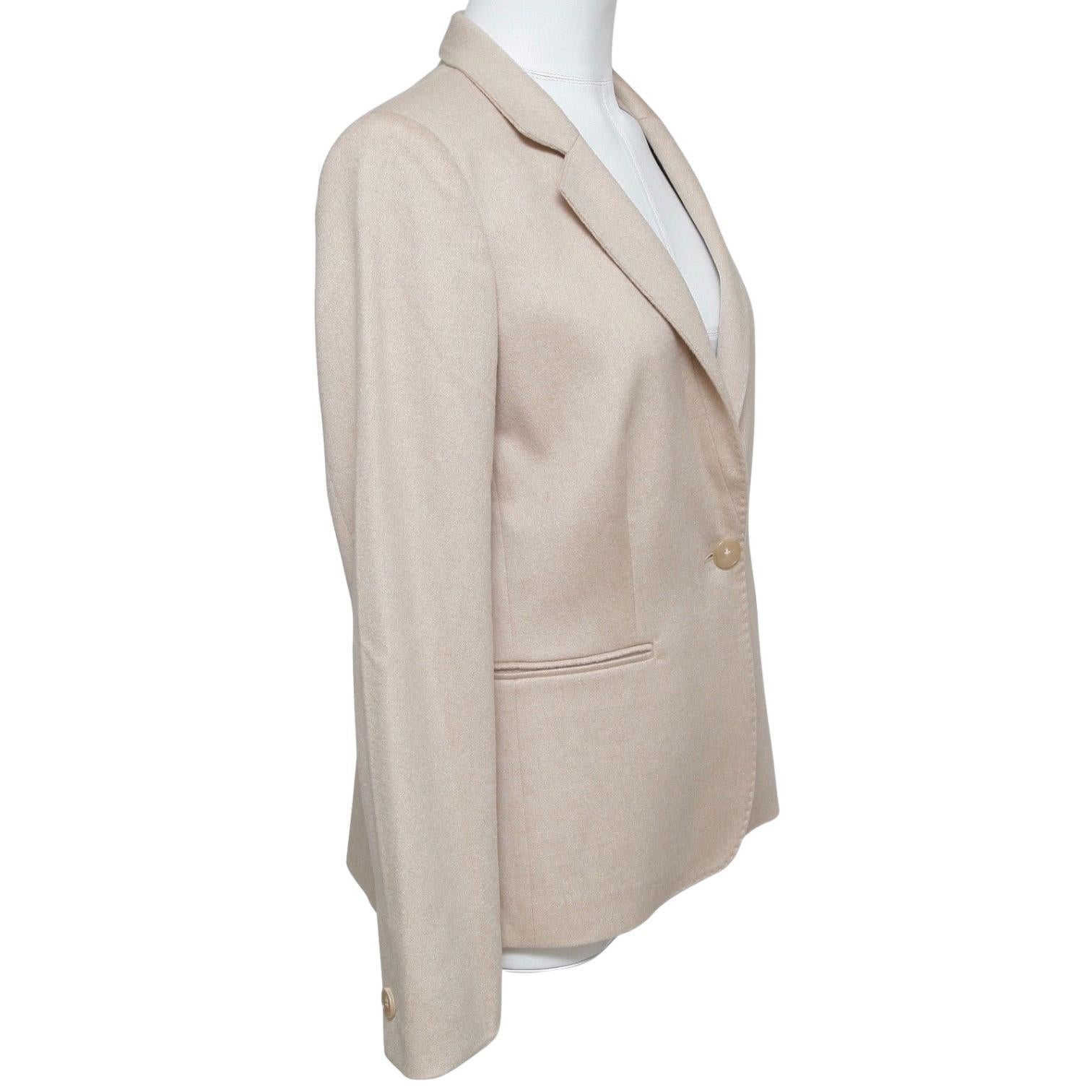 
GUARANTEED AUTHENTIC MAX MARA CAMEL HAIR BLAZER


Design:
  - Classic camel hair blazer in a rich beige color.
  - Looks great paired with jeans or dressed, very comfortable.
  - Notched lapel, front  center button closure.
  - Dual slit pockets,