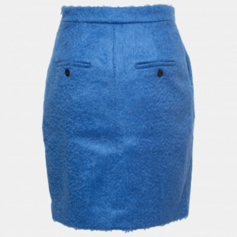 Cette jupe crayon de Max Mara a une forme flatteuse. Il est en laine et se ferme par un zip. La jupe bleue sera du plus bel effet avec un chemisier à imprimé floral et des talons hauts.