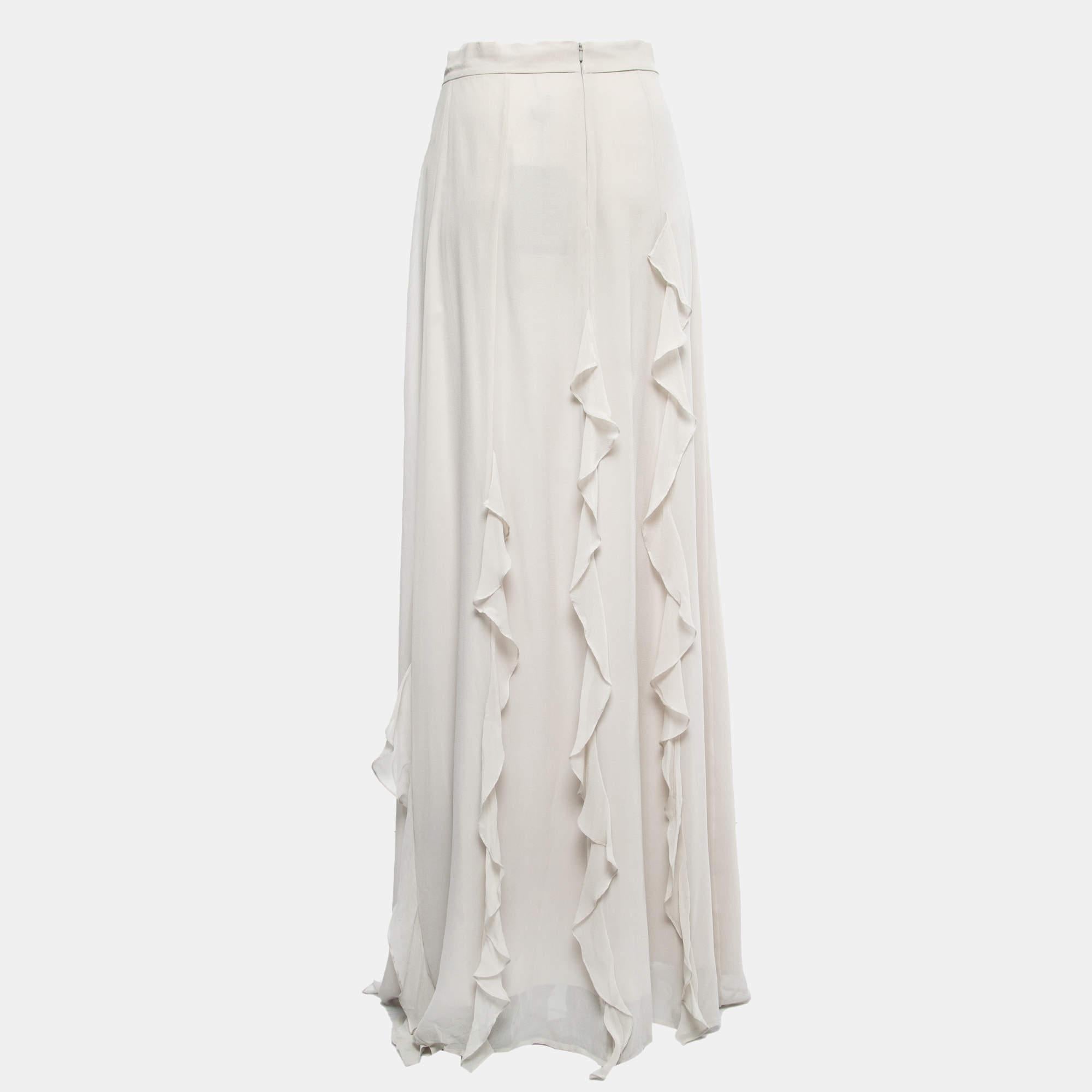 The Max Mara Serafin skirt is an elegant and luxurious fashion piece. Made from high-quality silk, it features delicate ruffles and a flowing maxi length. The skirt exudes femininity and sophistication, making it a perfect choice for special