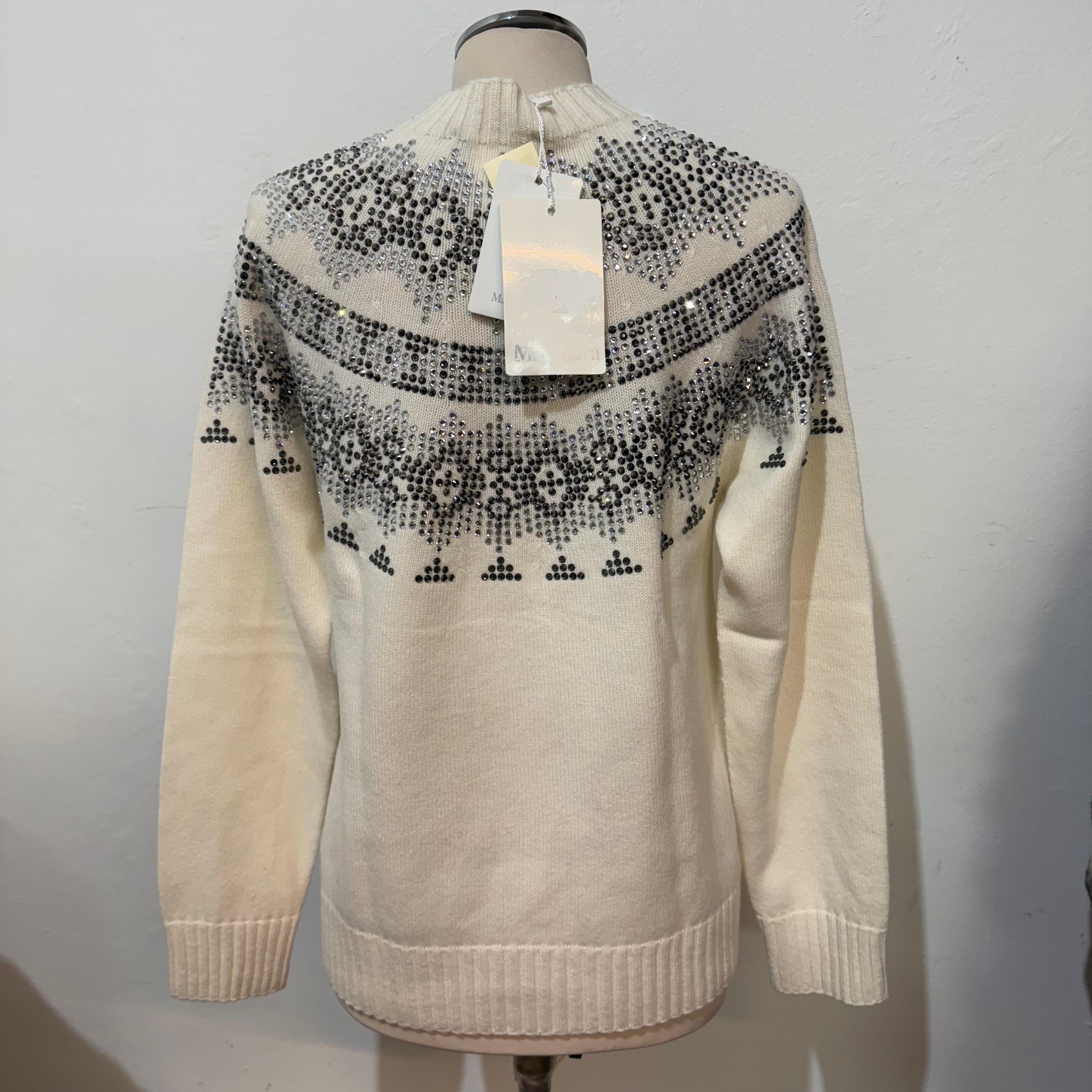 Brand new with tags Max Mara pull
Round neck
Osmio model
Wool and cashmere
White color
Strass 
Shoulder/hem cm 55 (21,65 inches)
Shoulder cm 44 (17,3 inches)
Fast international shipping from Italy included in the price