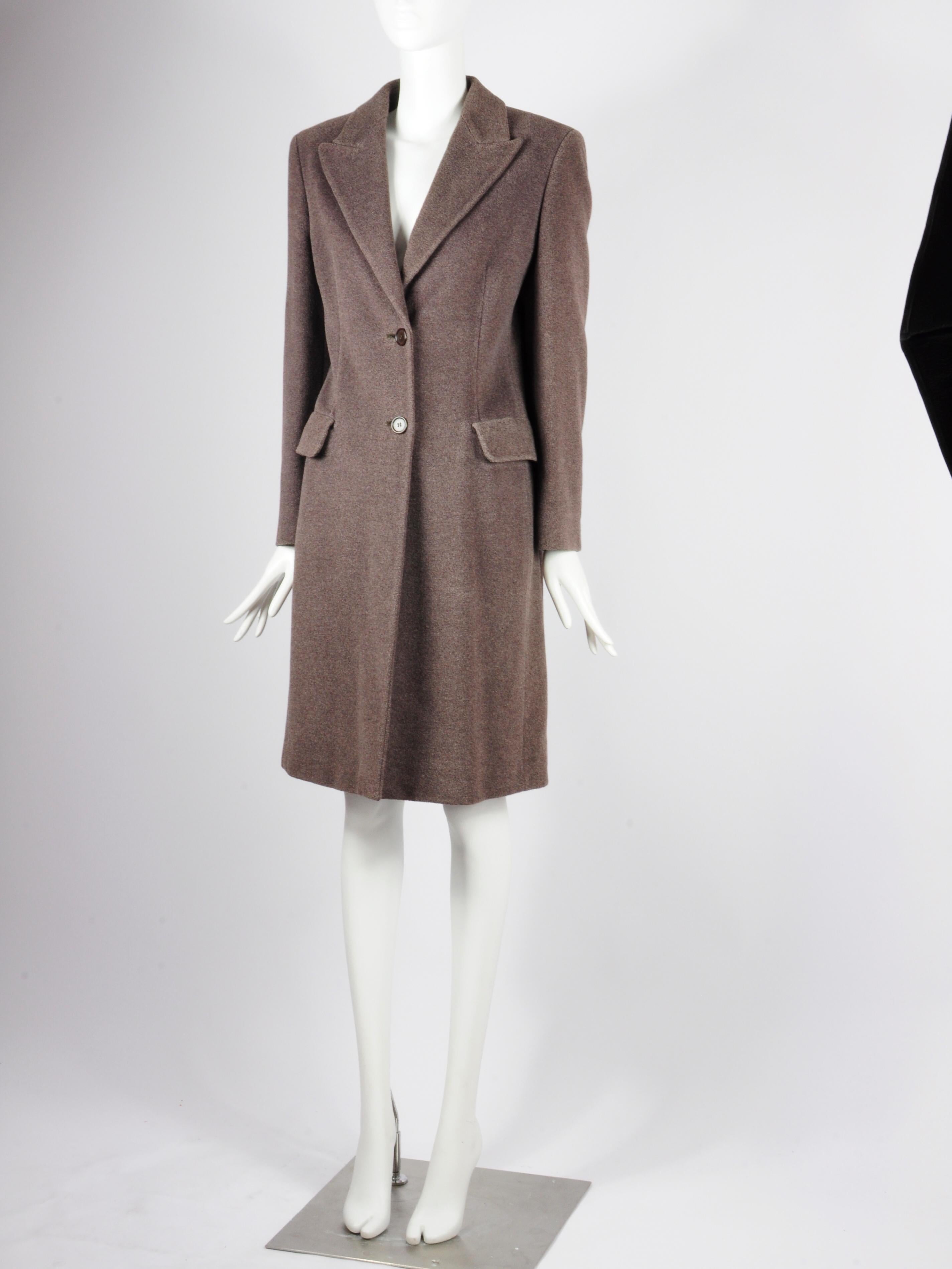 Max Mara light brown single breasted classic wool and silk coat from the 1990s. The tailoring on this Max Mara coat is very feminine and the fabric feels very soft due to the wool and silk blend. A Max Mara coat is a true italian classic.

BRAND