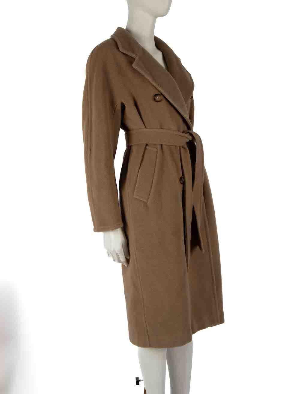 CONDITION is Very good. Minimal wear to coat is evident. The care label has been removed and there is one small abrasion to the back of the coat on this used Max Mara designer resale item.
 
Details
Brown
Cashmere
Coat
Double breasted
Button
