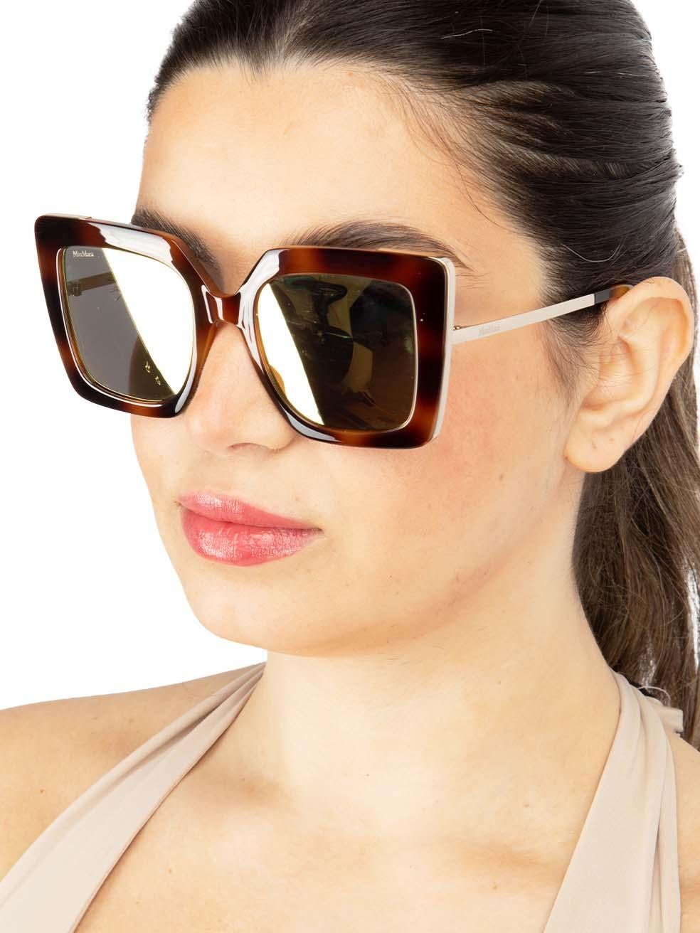 CONDITION is New with tags on this brand new Max Maradesigner item. This item comes with original packaging.
 
 
 
 Details
 
 
 Model: MM 0051 52G 52
 
 Brown
 
 Acetate
 
 Square Eye Sunglasses
 
 Mirrored Grey Lens
 
 Tortoiseshell pattern
 
