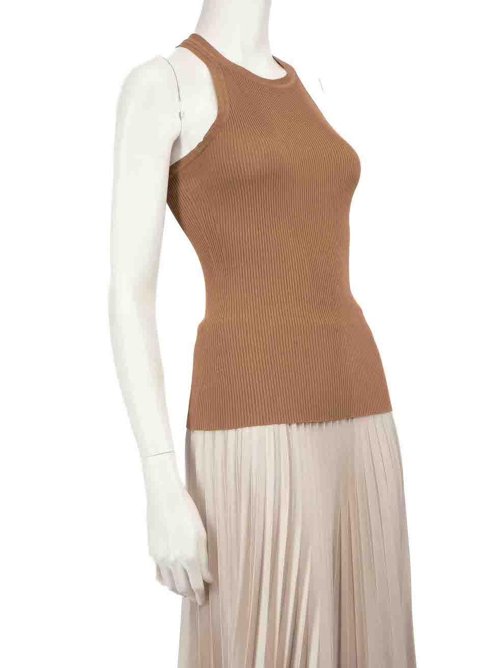 CONDITION is Very good. Minimal wear to top is evident. There are two small marks to the front of the top on this used Max Mara designer resale item.
 
 
 
 Details
 
 
 Brown
 
 Synthetic
 
 Tank top
 
 Sleeveless
 
 Round neckline
 
 Ribbed and