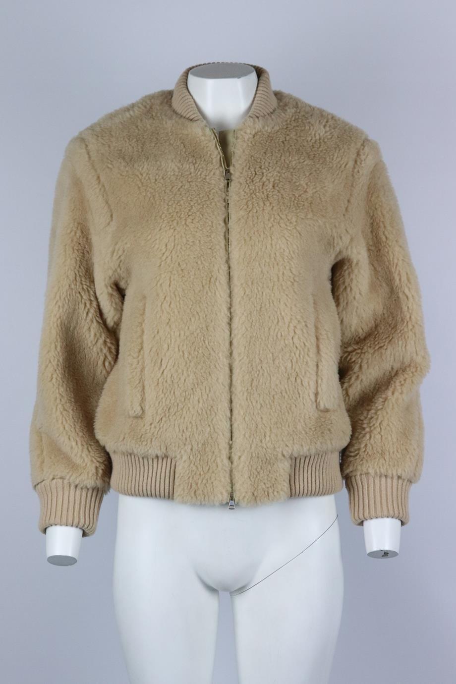 Max Mara camel hair and silk blend bomber jacket. Beige. Long sleeve, crewneck. Zip fastening at front. 88% Camelwool, 12% silk; fabric2: 100% polyester; lining: 68% acetate, 32% polyester; detail: 66% wool, 28% cashmere, 5% polyamide, 1% elastane.