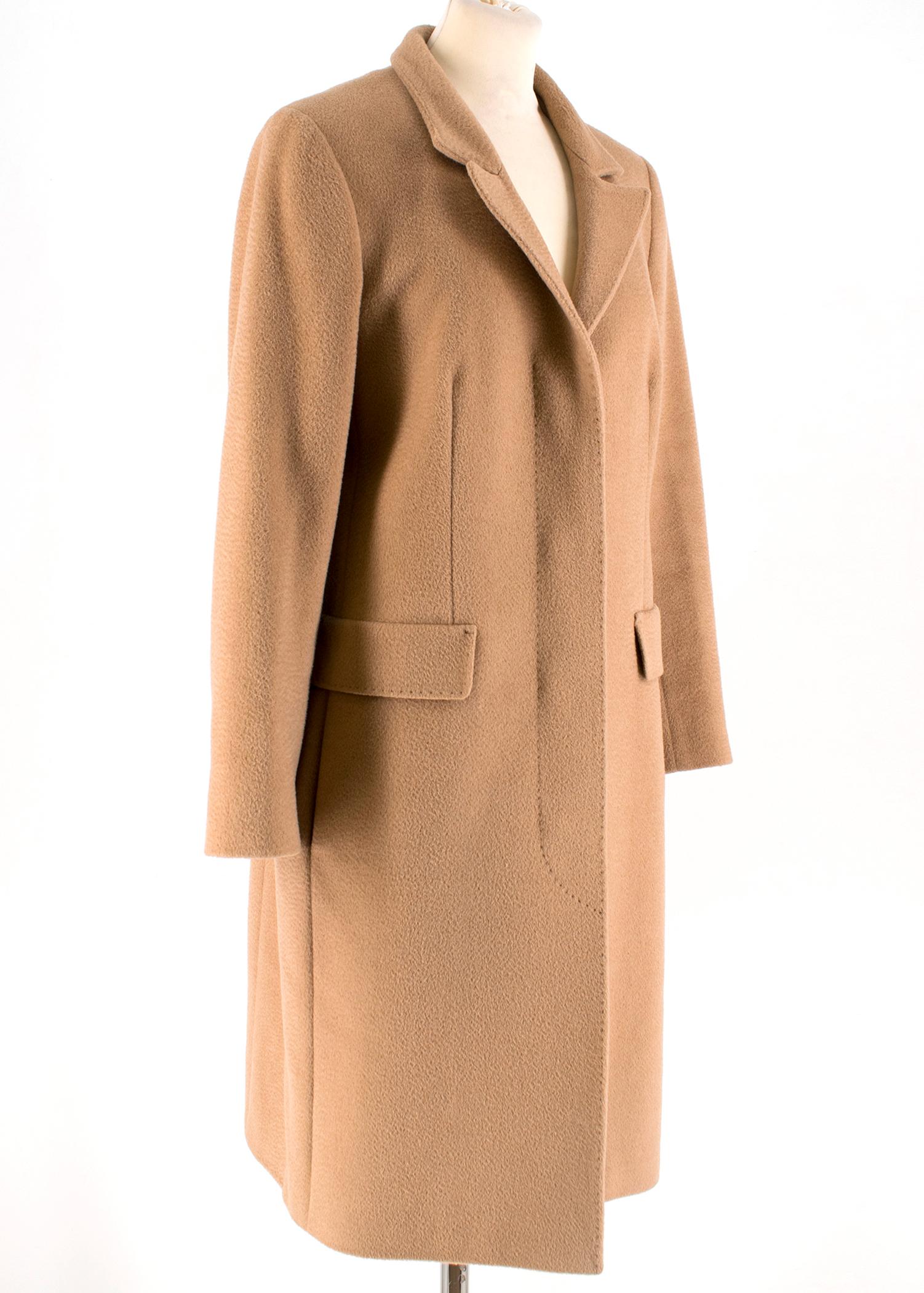 Max Mara Camel Hair Coat 

- Concealed button closure
- Long coat in pure camel fabric 
- Patch pockets on the front of the coat 
- Single vent to the back

Please note, these items are pre-owned and may show signs of being stored even when unworn
