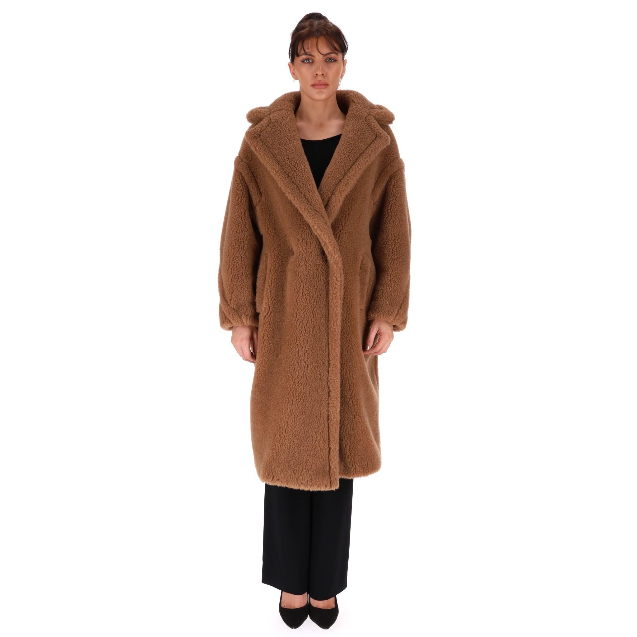 Max  Mara Camel Wool & Silk Teddy Coat 

The iconic oversized Teddy Bear coat in brown.

Special camel-hair texture on a silk base is created using sophisticated technology developed by the creative team with an Italian supplier, capable of