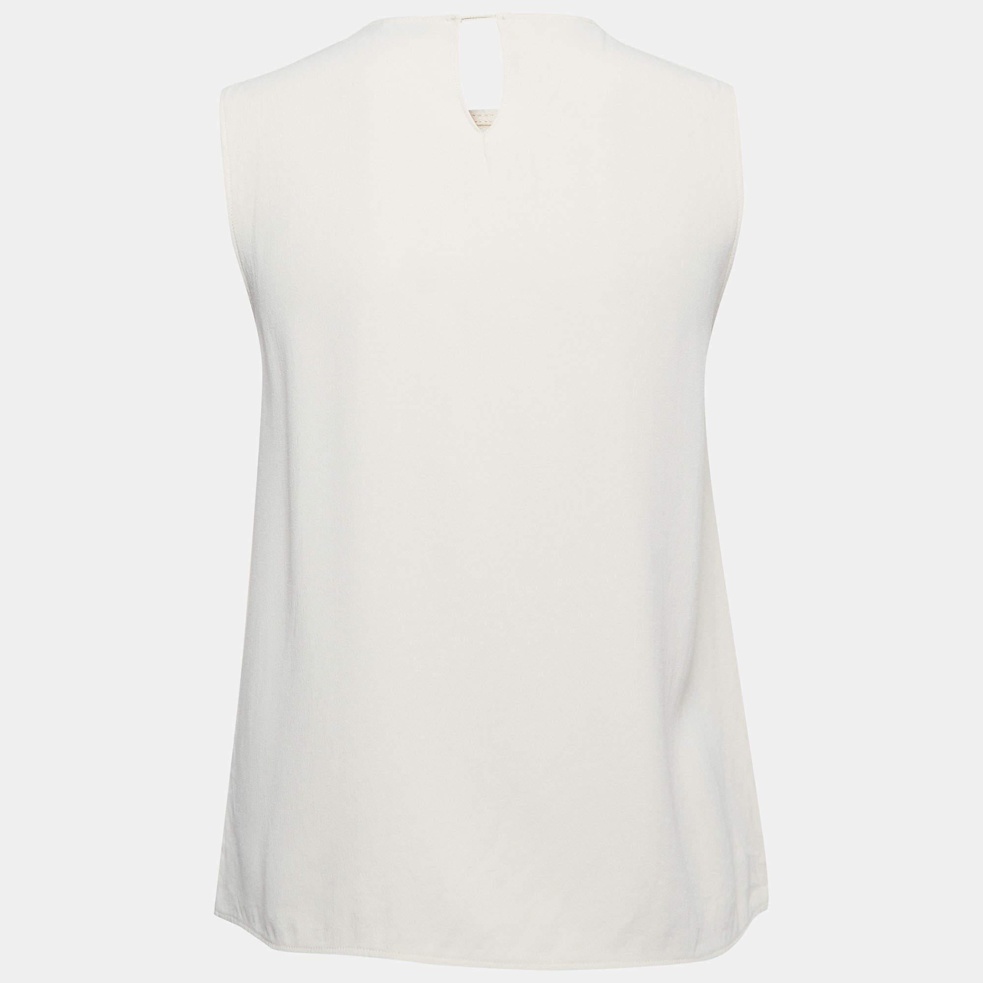 Careful tailoring  quality materials  and elegant cuts make this designer top a piece to cherish It comes in a classic design to be easy to style.