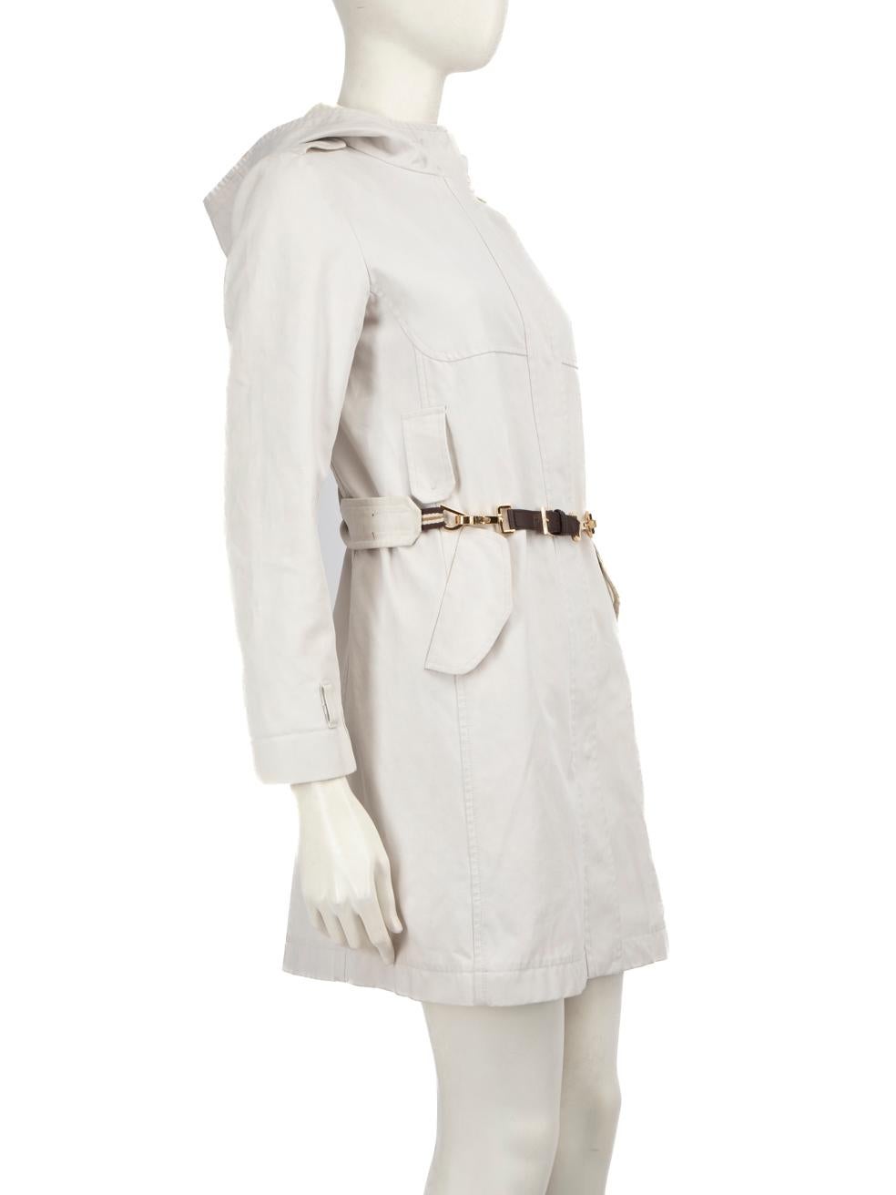 CONDITION is Very good. Minimal wear to the jacket is evident. Discolouration to the front left, front right, both sleeves back, hood, hood lining, back lining and on the waist band belt. Tarnishing on the snap button on the front left of this used