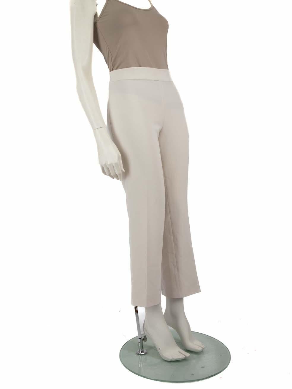 CONDITION is Very good. Hardly any visible wear to the trousers is evident on this used Max Mara designer resale item.
 
 Details
 Ecru
 Synthetic
 Straight trousers
 High rise
 Side zip and hook fastening
 
 
 Made in Italy
 
 Composition
 70%