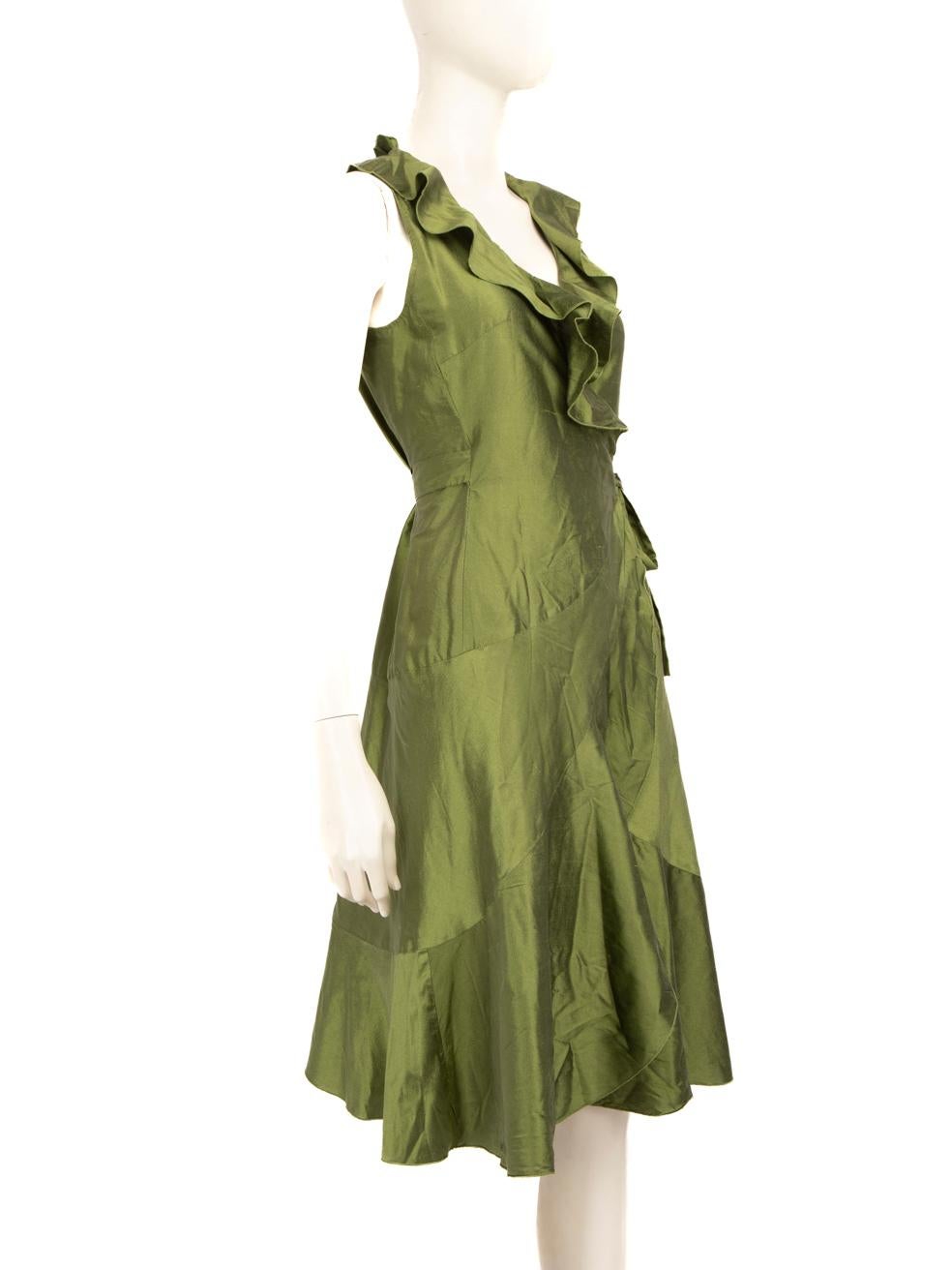 CONDITION is Very good. Hardly any visible wear to dress is evident on this used Max Mara designer resale item.
  
  Details
  
  
  Green
  
  Silk
  
  Wrap dress
  
  Knee length
  
  Sleeveless
  
  Ruffled trim
  
  V neck
  
  Belt fastening
 