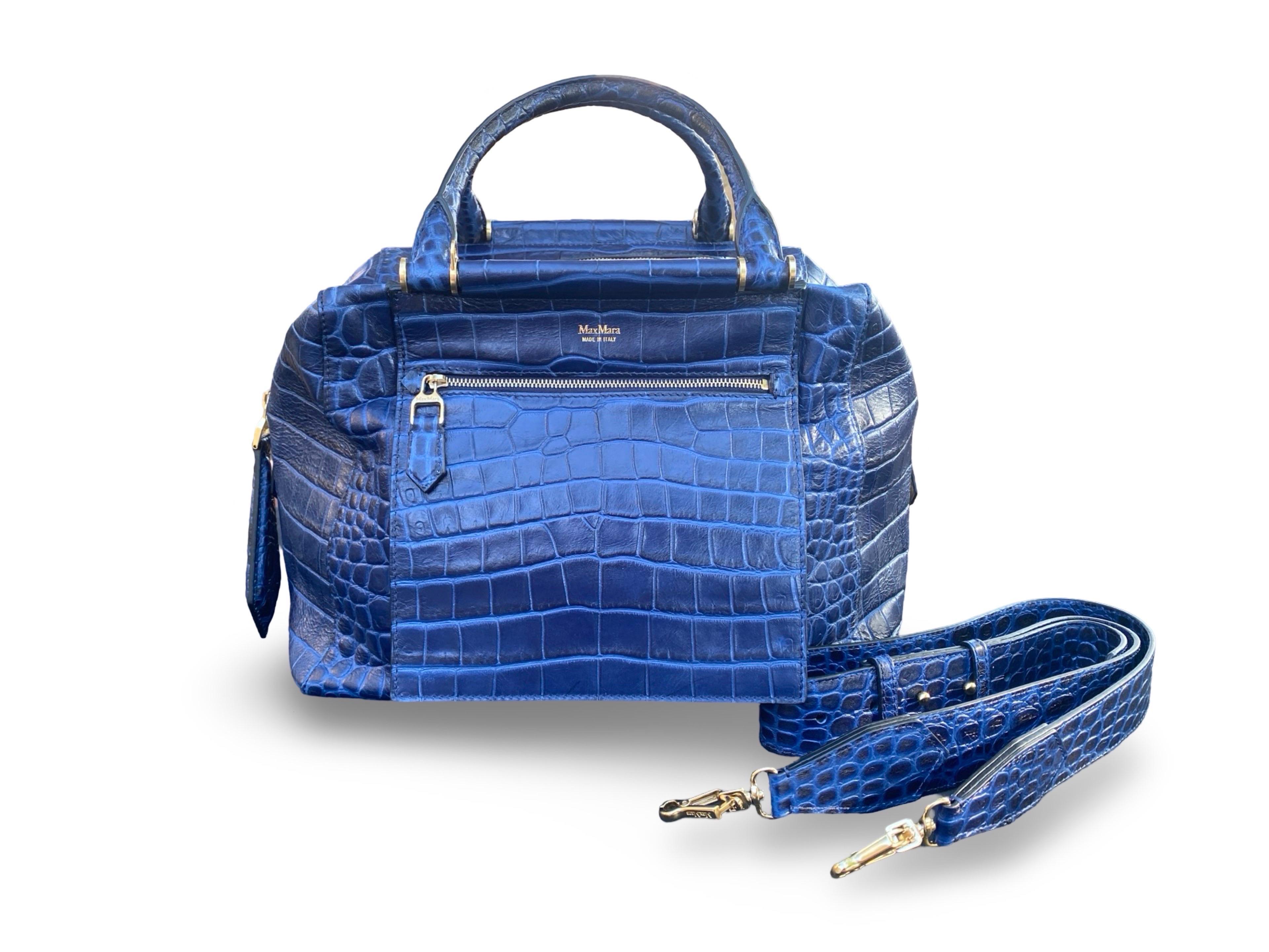 Max Mara. Crossbody navy leather crocodile embossed bag. As new. Our client received it as a gift from Italy but never used it. 

Why did this bag sell out worldwide? 

-Because it is so damn chic.
-It looks as expensive as a Kelly but more modern.
