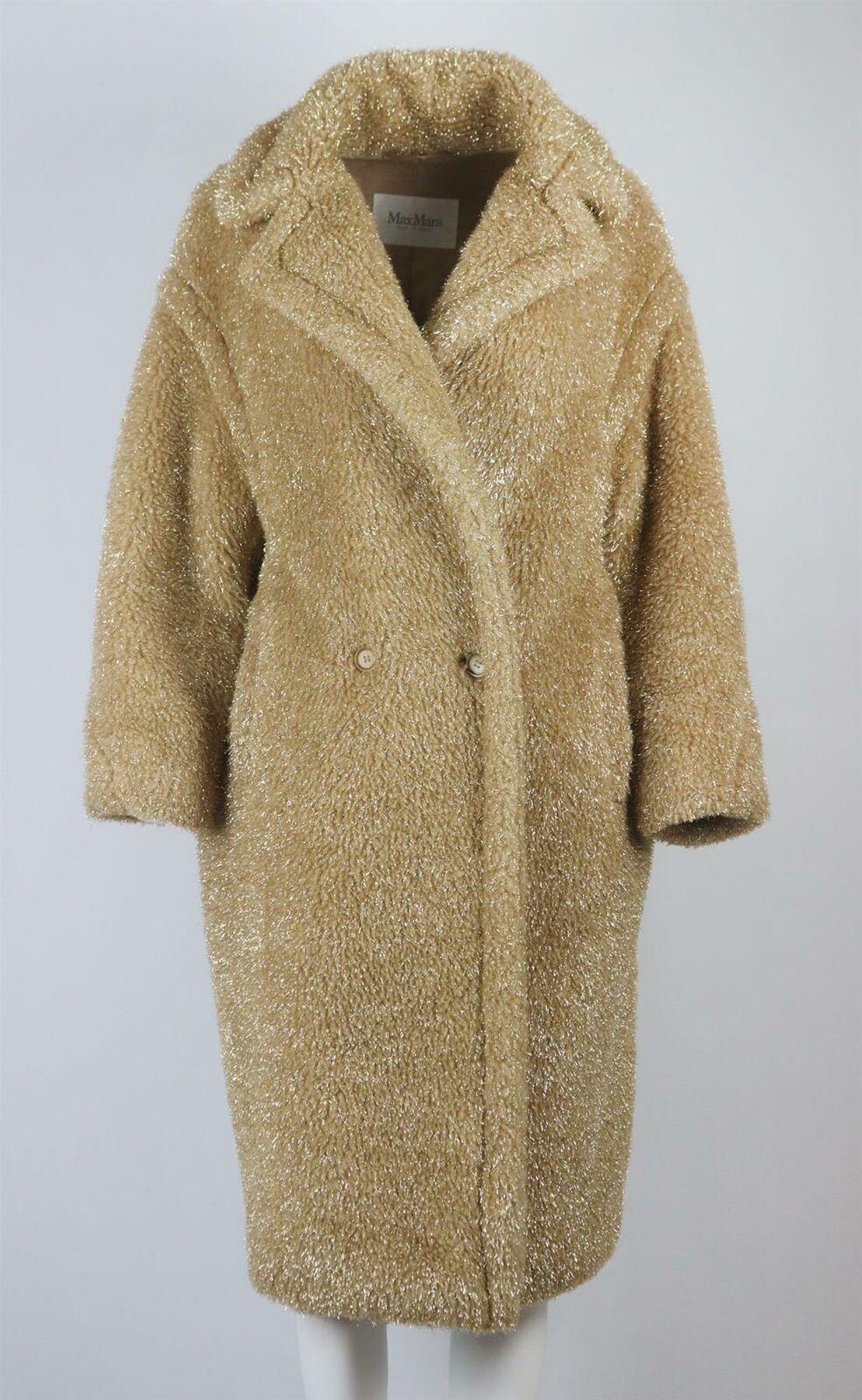 Max Mara's cult 'Teddy Bear' coat was such a hit when it first launched in 2013 that it was reissued again and again - the label says that wearing it 