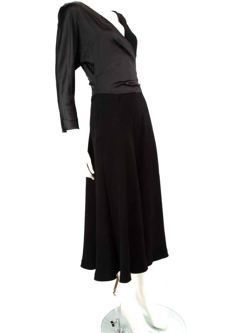 CONDITION is Very good. Minimal wear to dress is evident. Minimal pull thread to left sleeve and left cuff as well as rear waistline and rear left side of hemline on this used Max Mara Pianoforte designer resale item.
 
 
 
 Details
 
 
 Black
 
