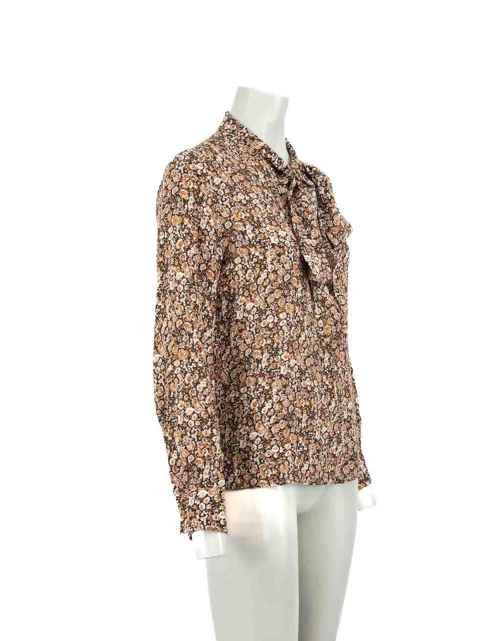 CONDITION is Very good. Hardly any visible wear to blouse is evident on this used Max Mara Studio designer resale item.
 
Details
Brown
Silk
Long sleeves blouse
Floral print pattern
Front button up closure
Tie neck strap closure
Buttoned cuffs
Made