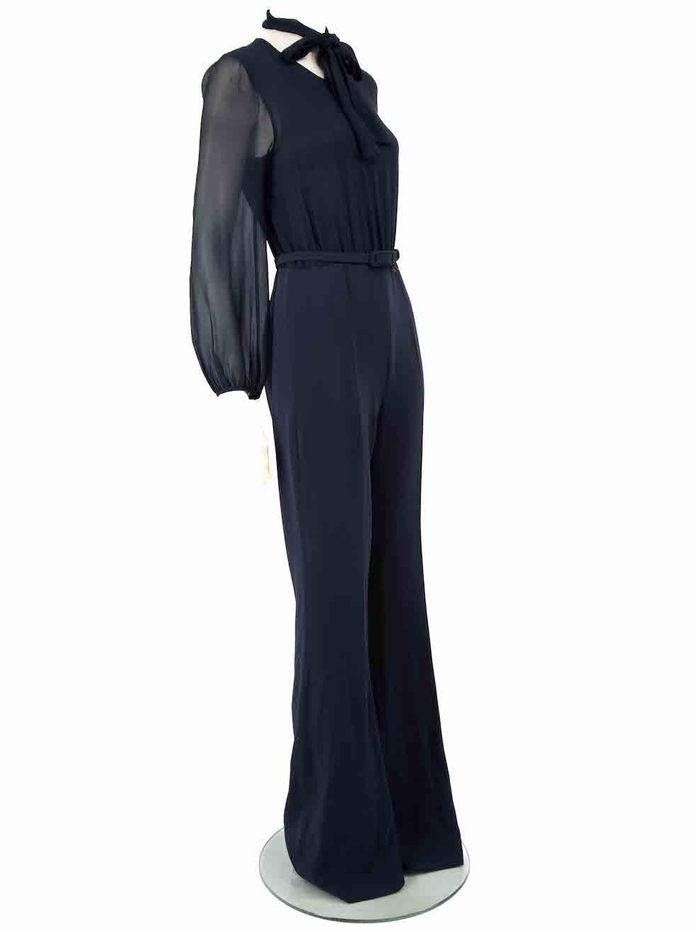 CONDITION is Very good. Hardly any visible wear to jumpsuit is evident on this used Max Mara designer resale item.
 
 
 
 Details
 
 
 Navy
 
 Silk
 
 Jumpsuit
 
 Sheer top and sleeves
 
 Round neck
 
 Wide leg
 
 Back zip fastening
 
 Belt