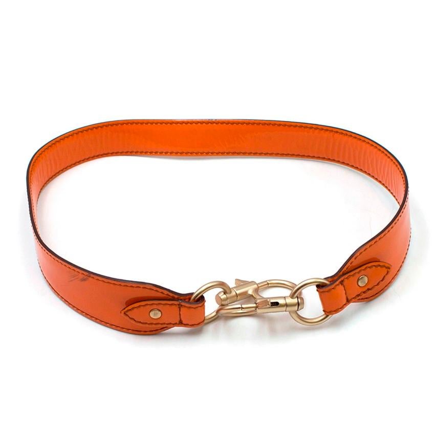 Max Mara Orange Patent Slouchy Handbag

- Glossy orange patent handbag 
- Slouchy style
- Ruched opening
- Brown leather braided handles
- Detachable shoulder strap
- Brown embroidered branding satin lining
- Internal zipped compartment and patent