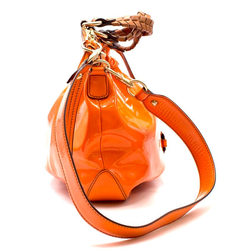 orange shiny handbag bag